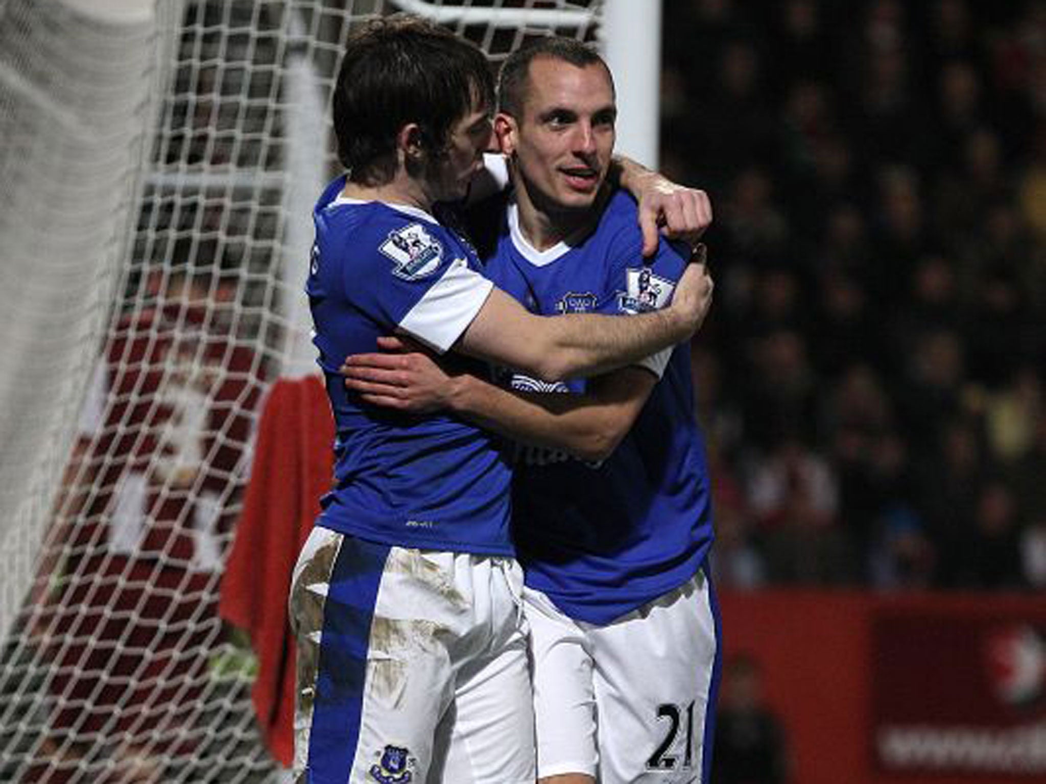 Leighton Baines congratulates Leon Osman