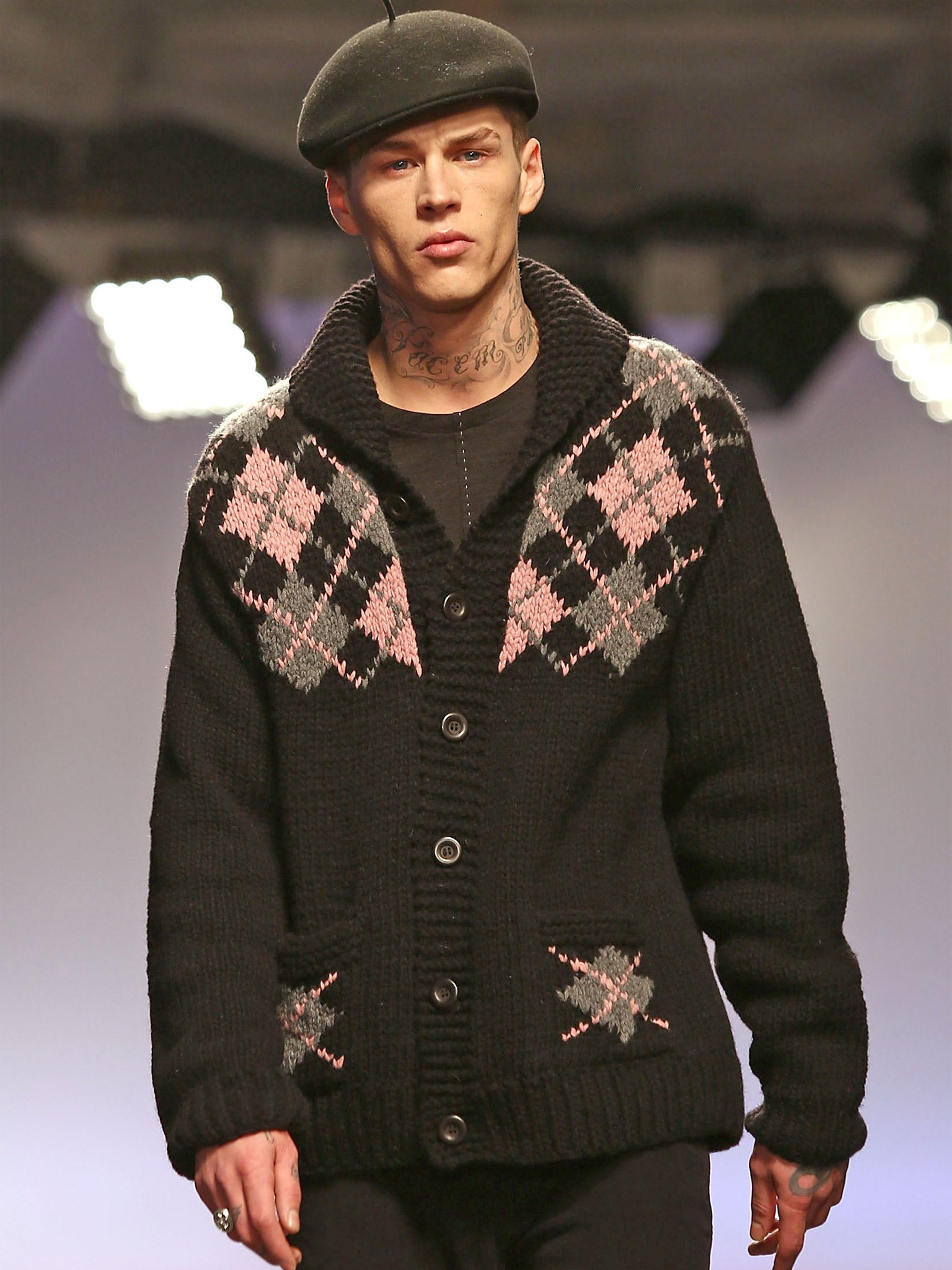 A model on the catwalk during the YMC show at the London Collections