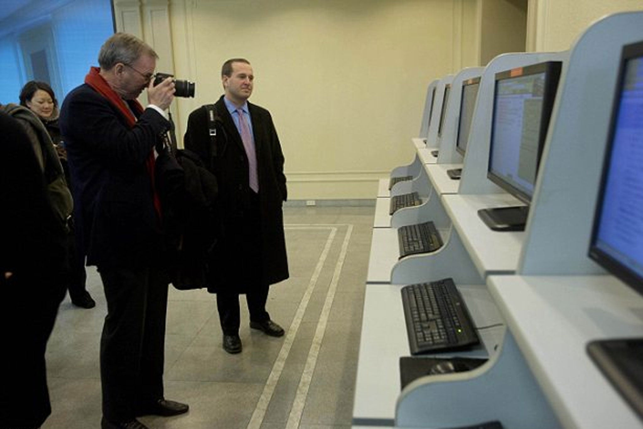 Eric Schmidt takes a picture of computers at Kim Il Sung University in Pyongyang