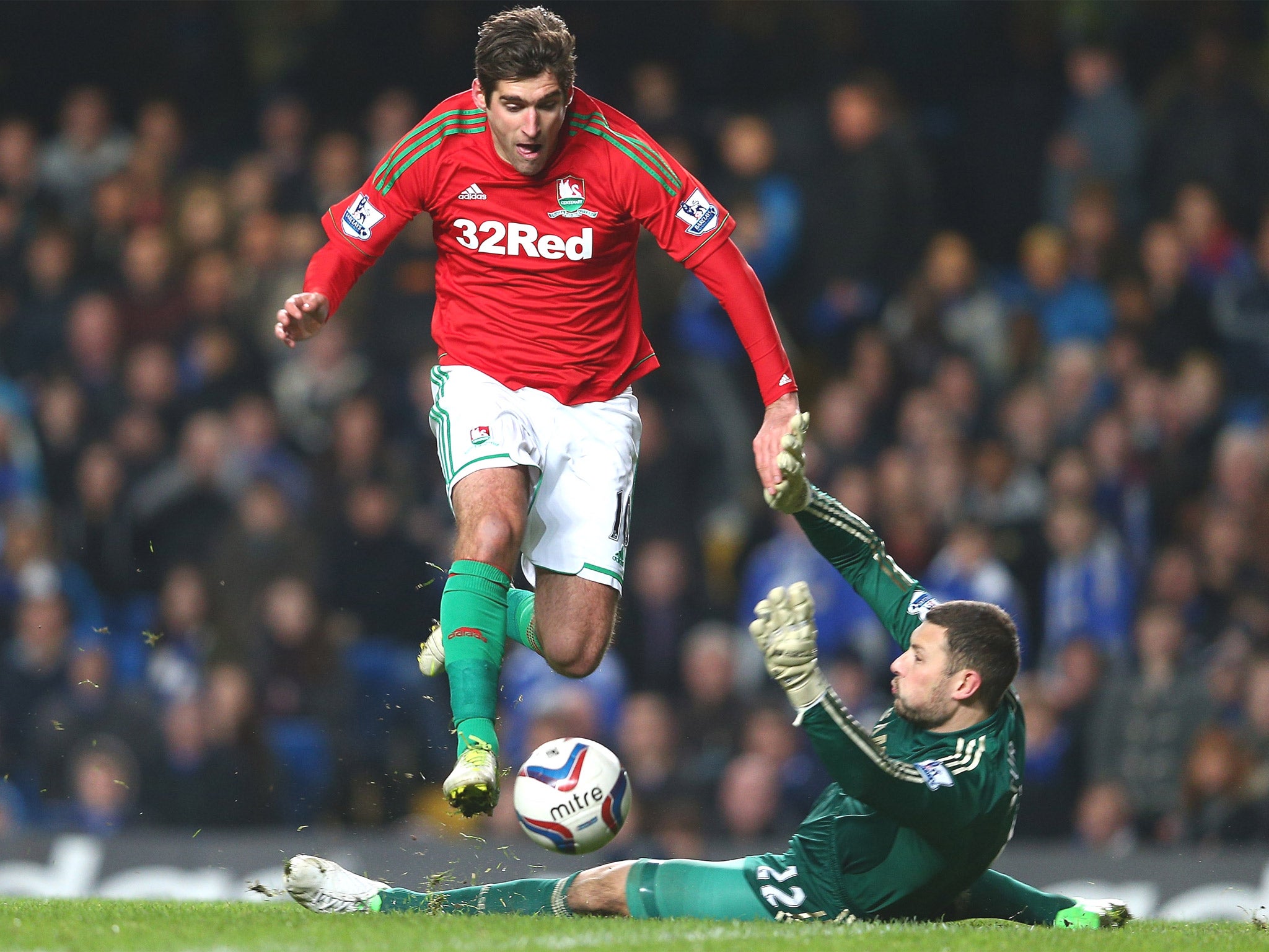 Danny Graham rounds Ross Turnbull to score Swansea’s second goal last night