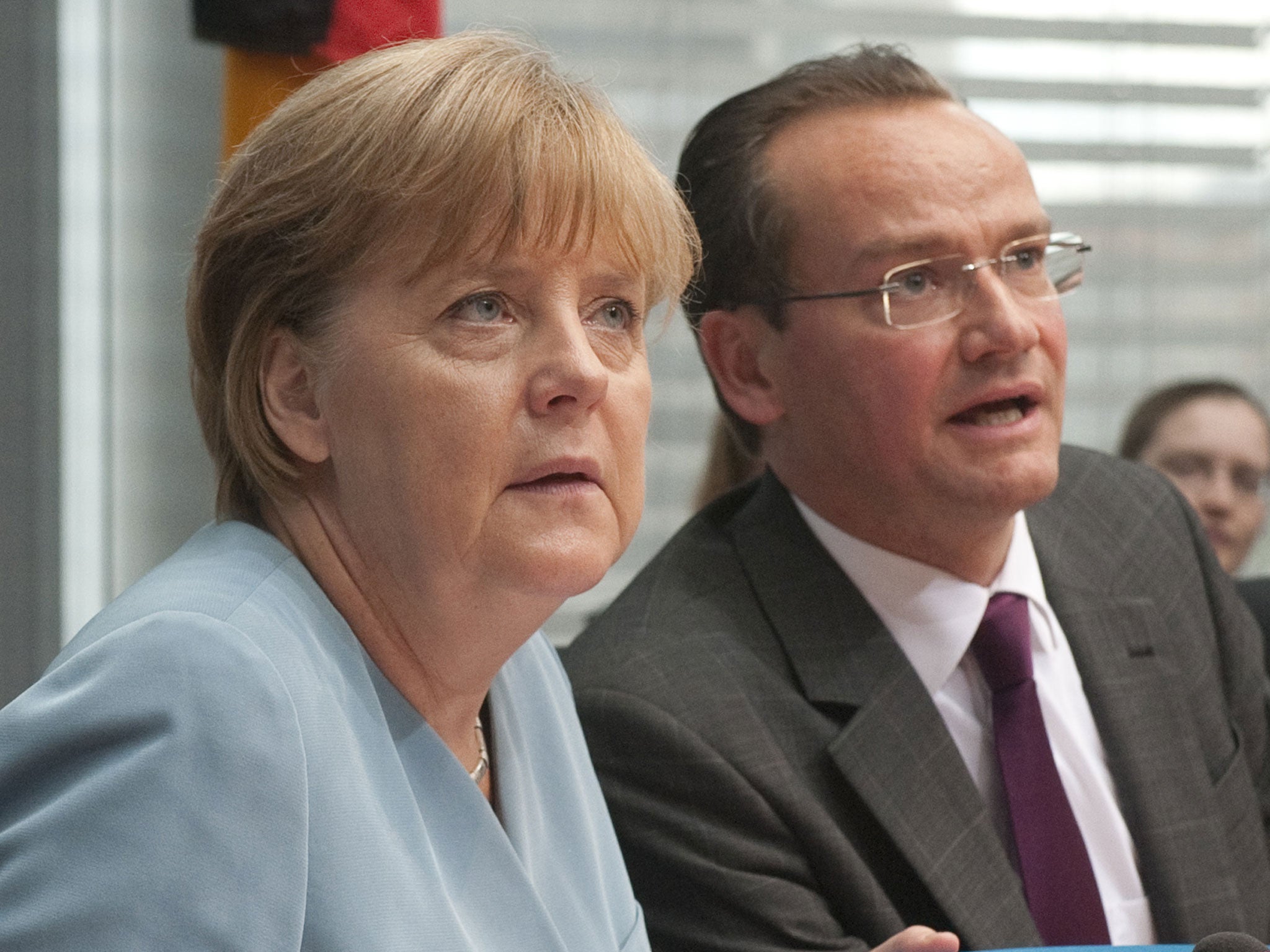 German Chancellor Angela Merkel and chair of Germany’s European affairs committee, Gunther Krichbaum. Krichbaum said of the UK's threat to leave the EU: 'You cannot create a political future if you are blackmailing other states'