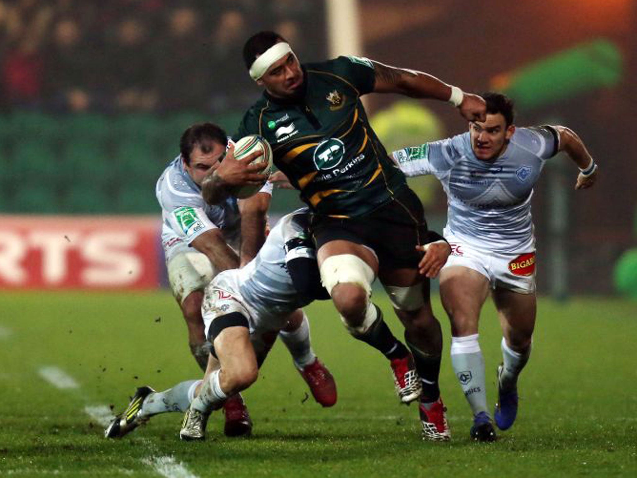 Northampton lock Samu Manoa charges through the Castres defence at Franklin’s Gardens last night