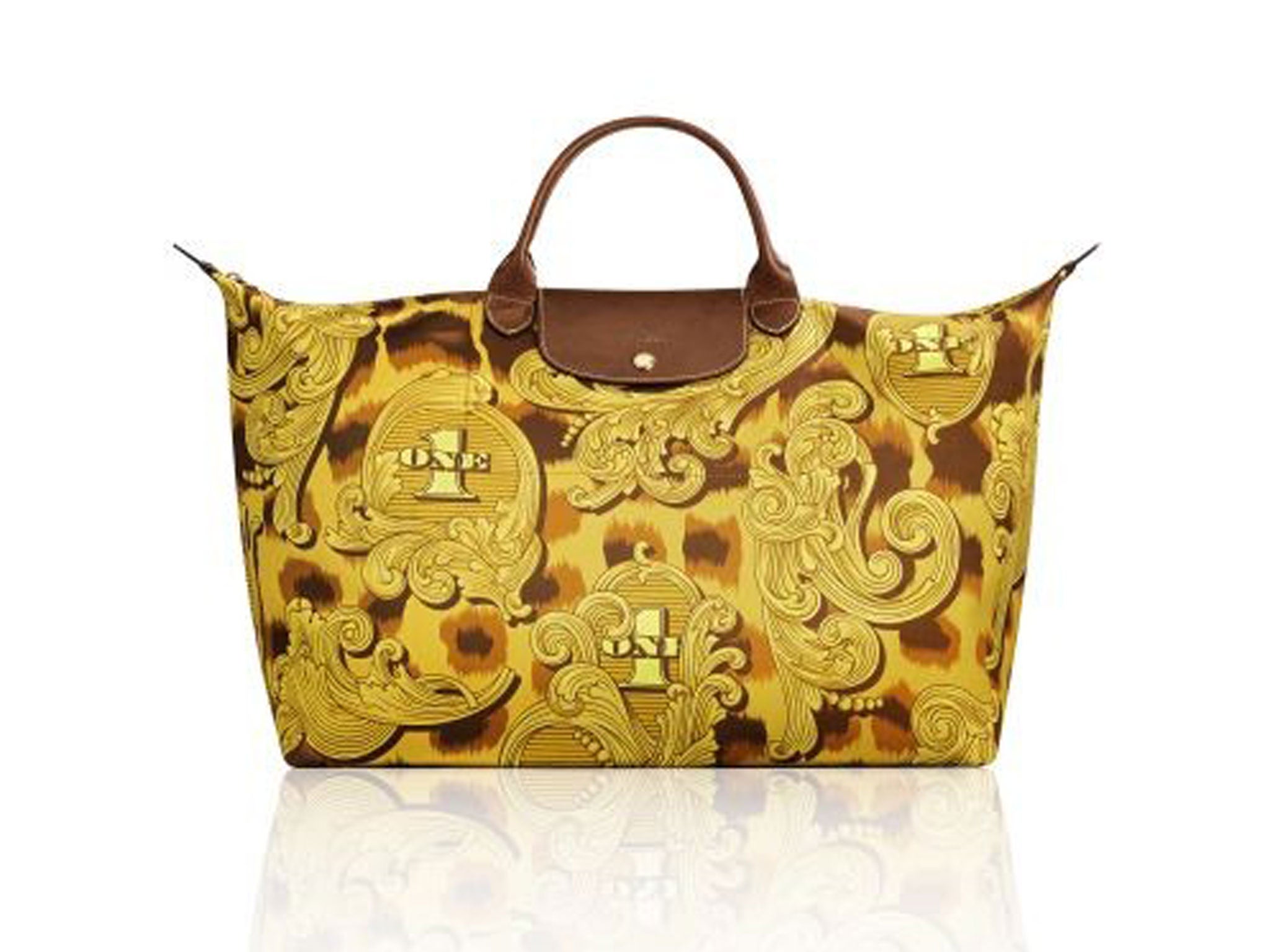 We Love: Totes amaze - If you're shy and retiring look away now – Jeremy Scott channels his maximal aesthetic into baroque baggage for Longchamp's legendary lightweight Le Pliage holdall combining curlicues and leopard print. longchamp.com