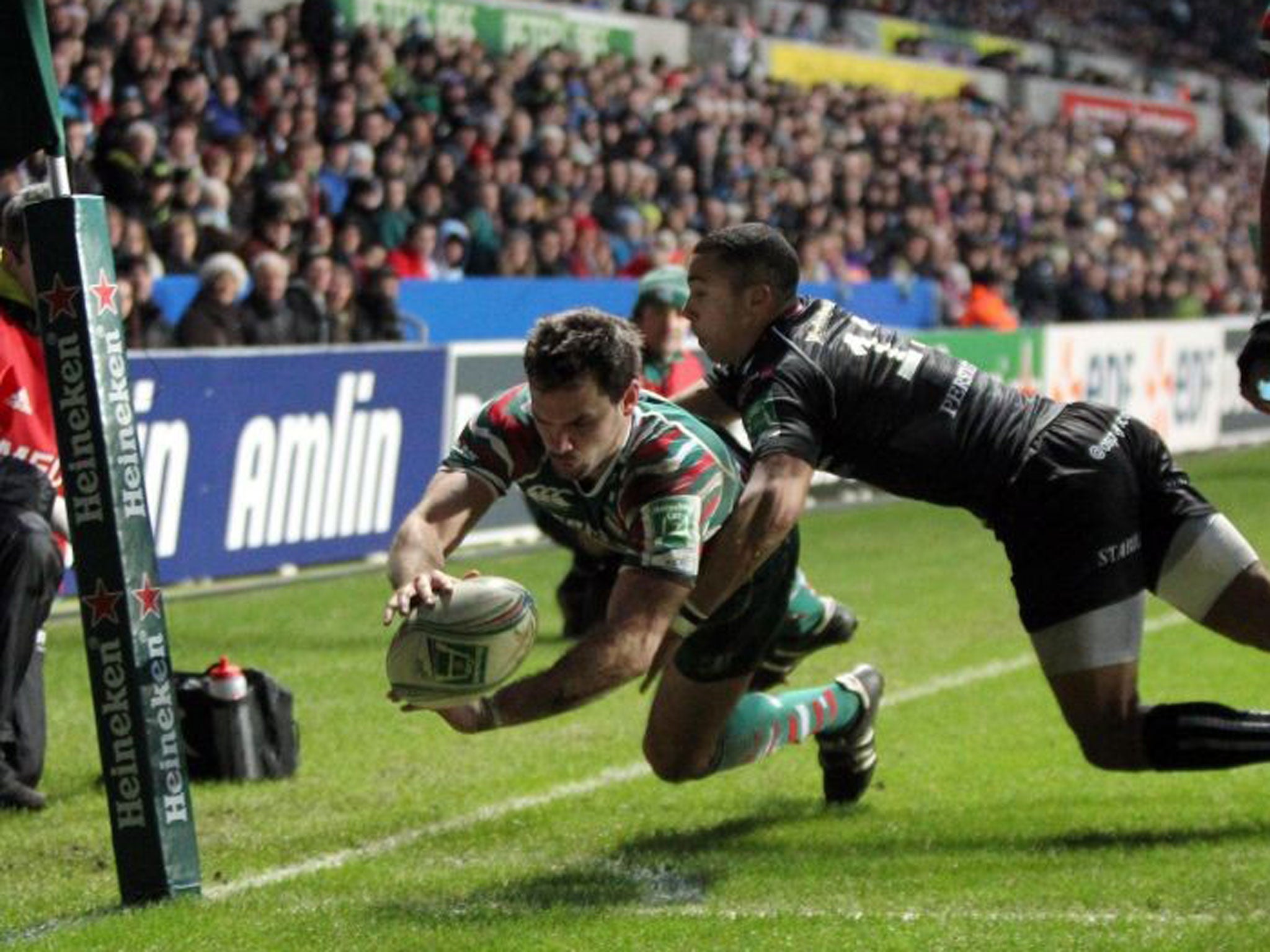 Leicester wing Niall Morris dives over to claim his team’s second try yesterday