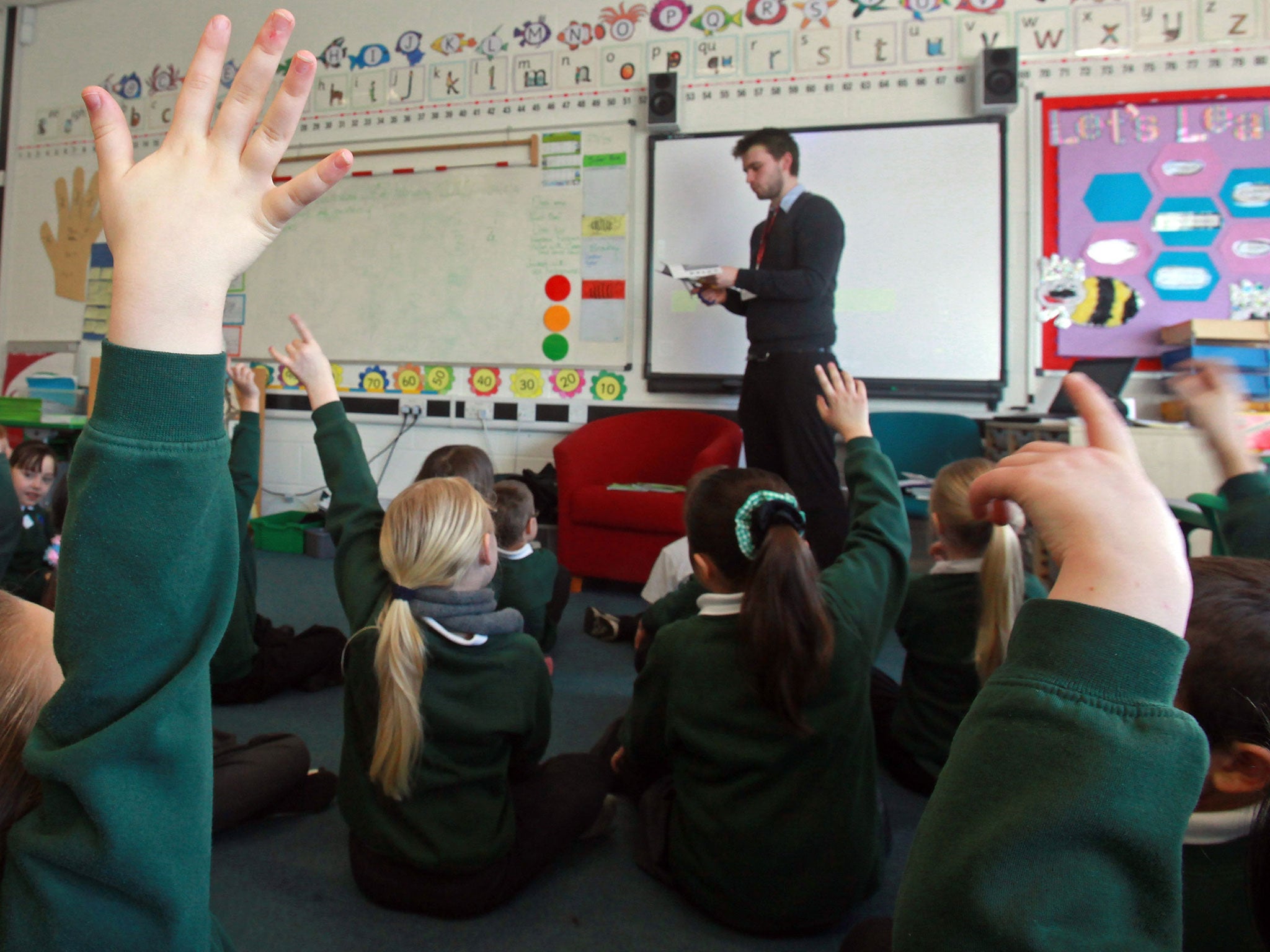 School pupils at the Bridge Learning Campus answer questions in a classroom at the school on February 24, 2010 in Bristol, England.