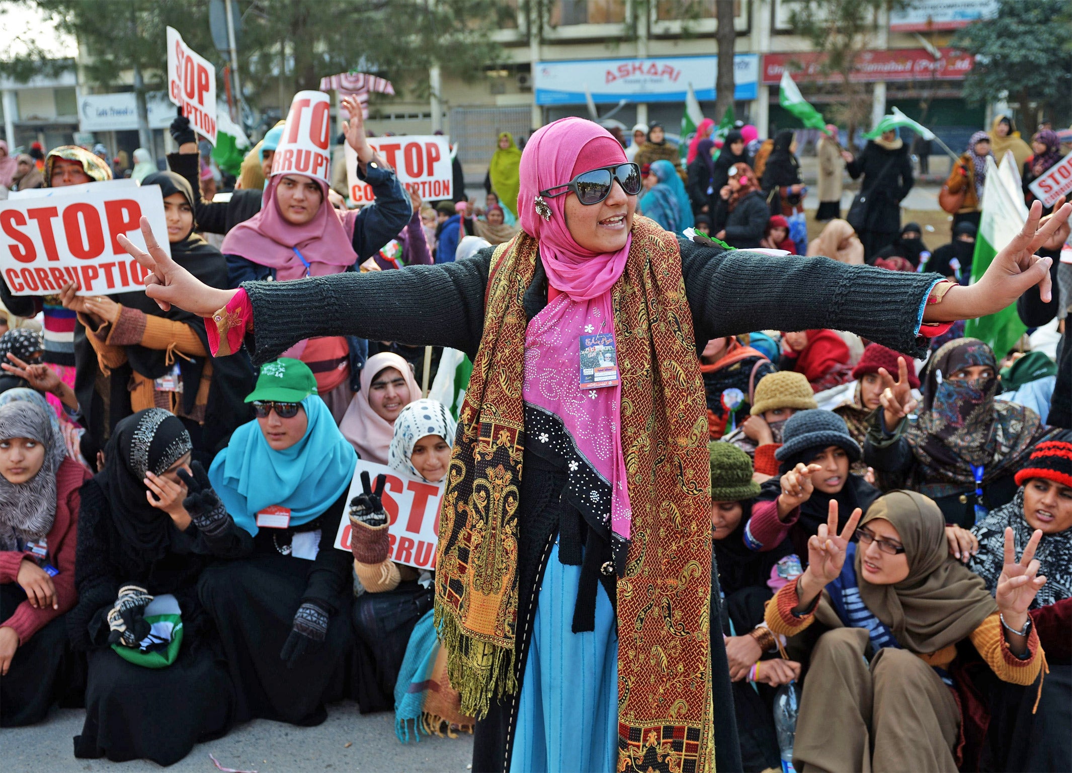 Thousands of protesters poured on to the streets of the capital, prompting police to erect barriers outside parliament