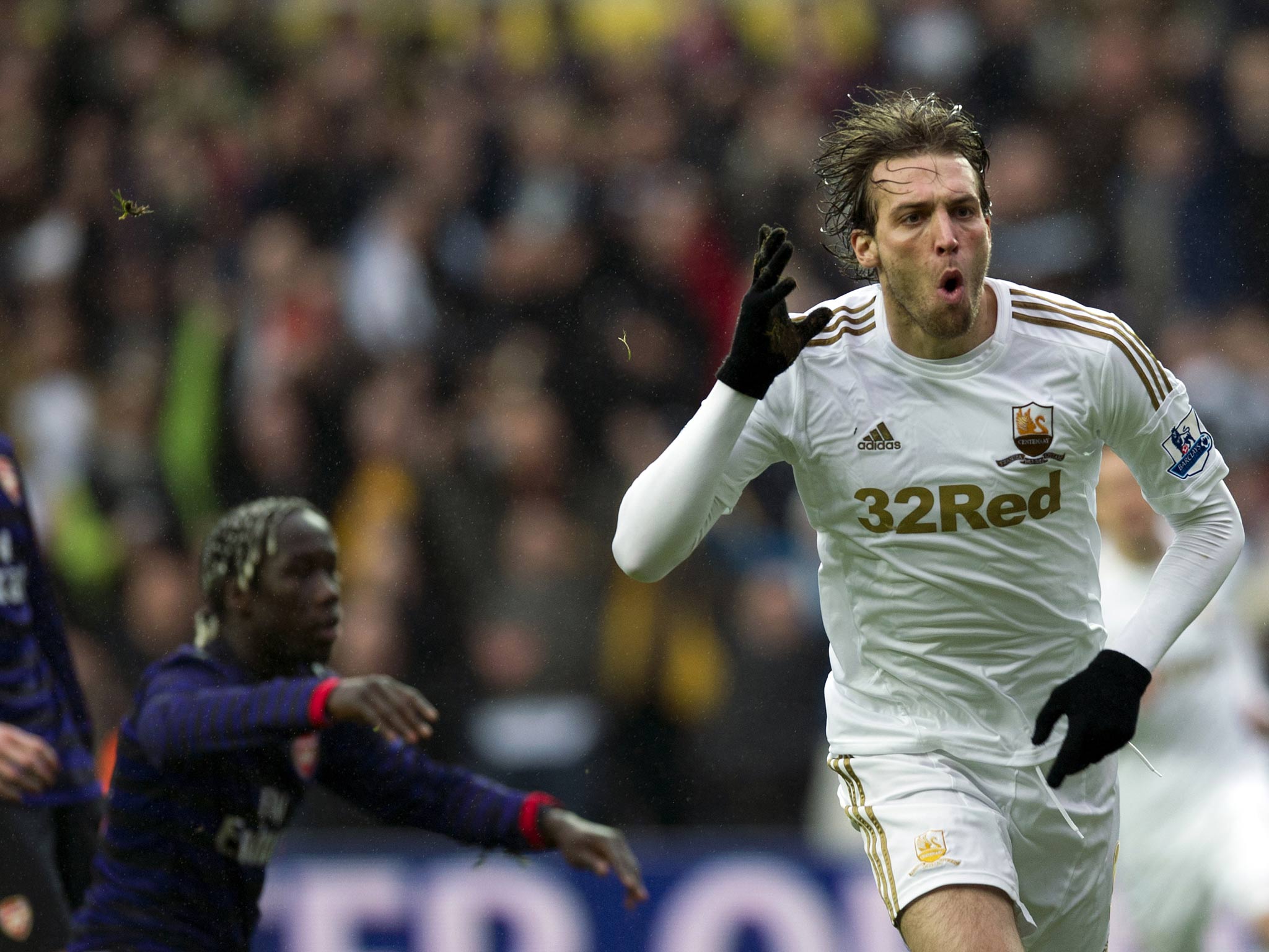 Michu celebrates scoring against Arsenal in the FA Cup