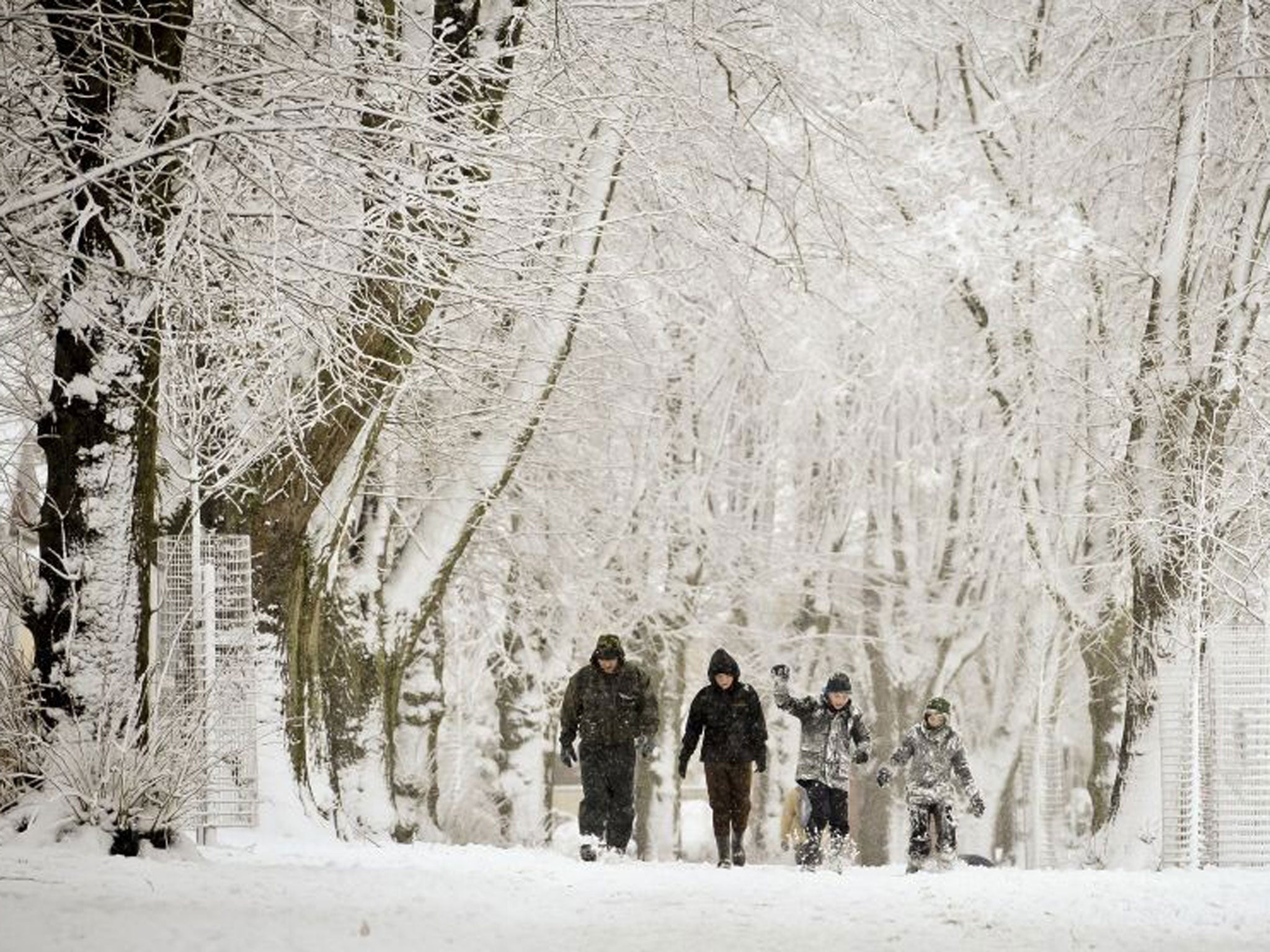 People take a walk in Victoria Park, Totterdown in Bristol