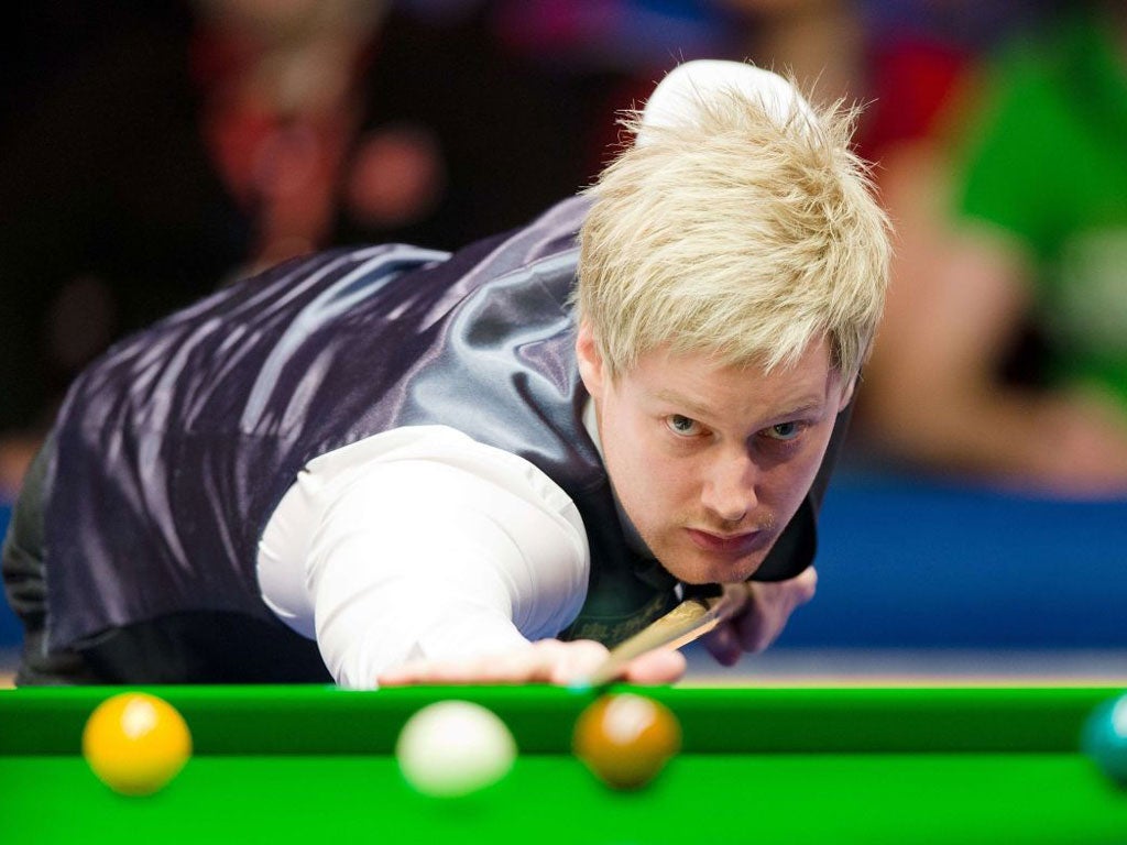 Neil Robertson lines up a shot during yesterday’s final