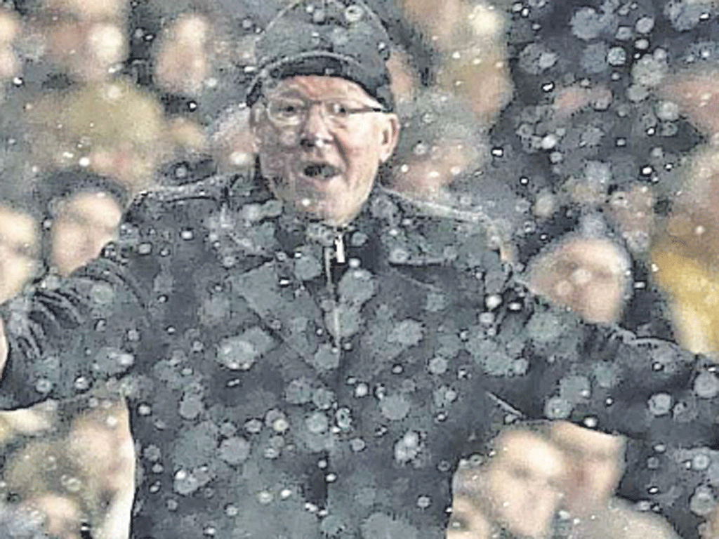 Sir Alex Ferguson gestures on the sidelines as his United side are
held by Spurs