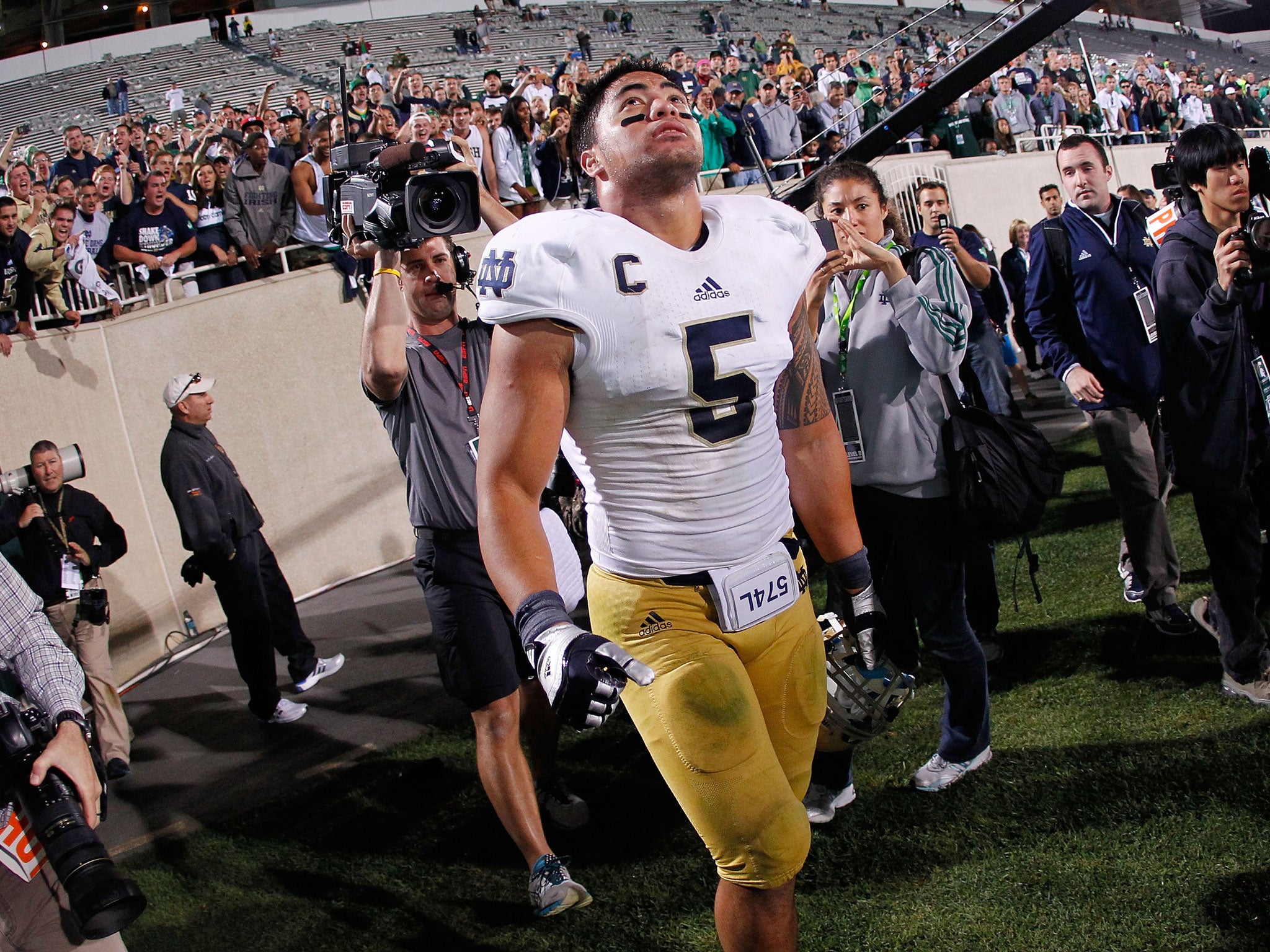 Manti Te'o #5 of the Notre Dame Fighting Irish reacts after beating the Notre Dame Fighting Irish 20-3 at Spartan Stadium Stadium on September 15, 2012 in East Lansing, Michigan.