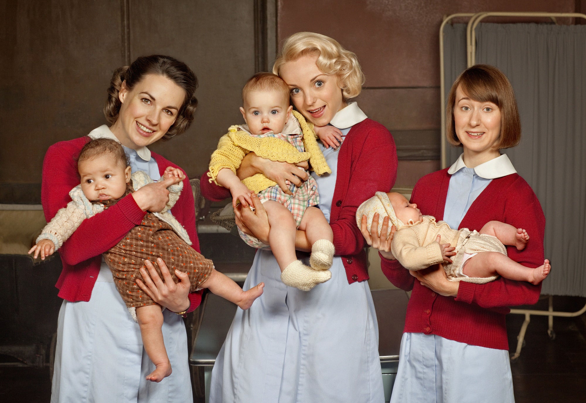 Call The Midwife stars Jenny Lee (Jessica Raine), Trixie Franklin (Helen George) and Cynthia Miller (Bryony Hannah) with their baby co-stars