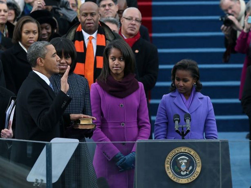 Sasha, Malia and Michelle Obama at the ceremony
