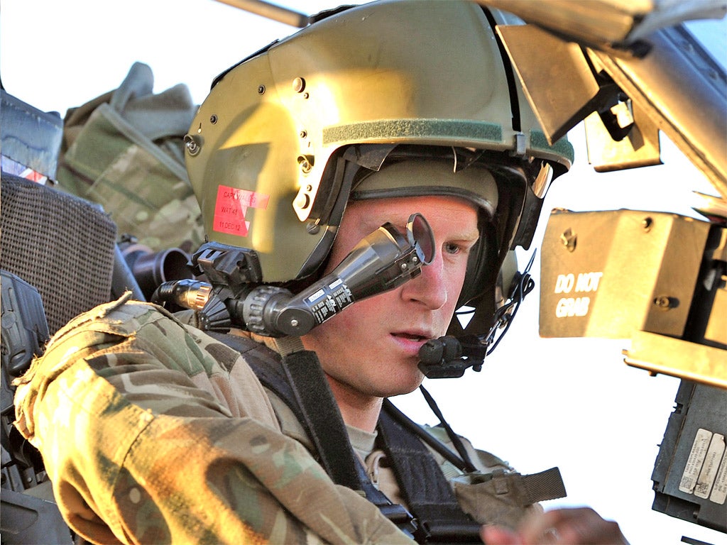 Prince Harry at the controls of an Apache helicopter