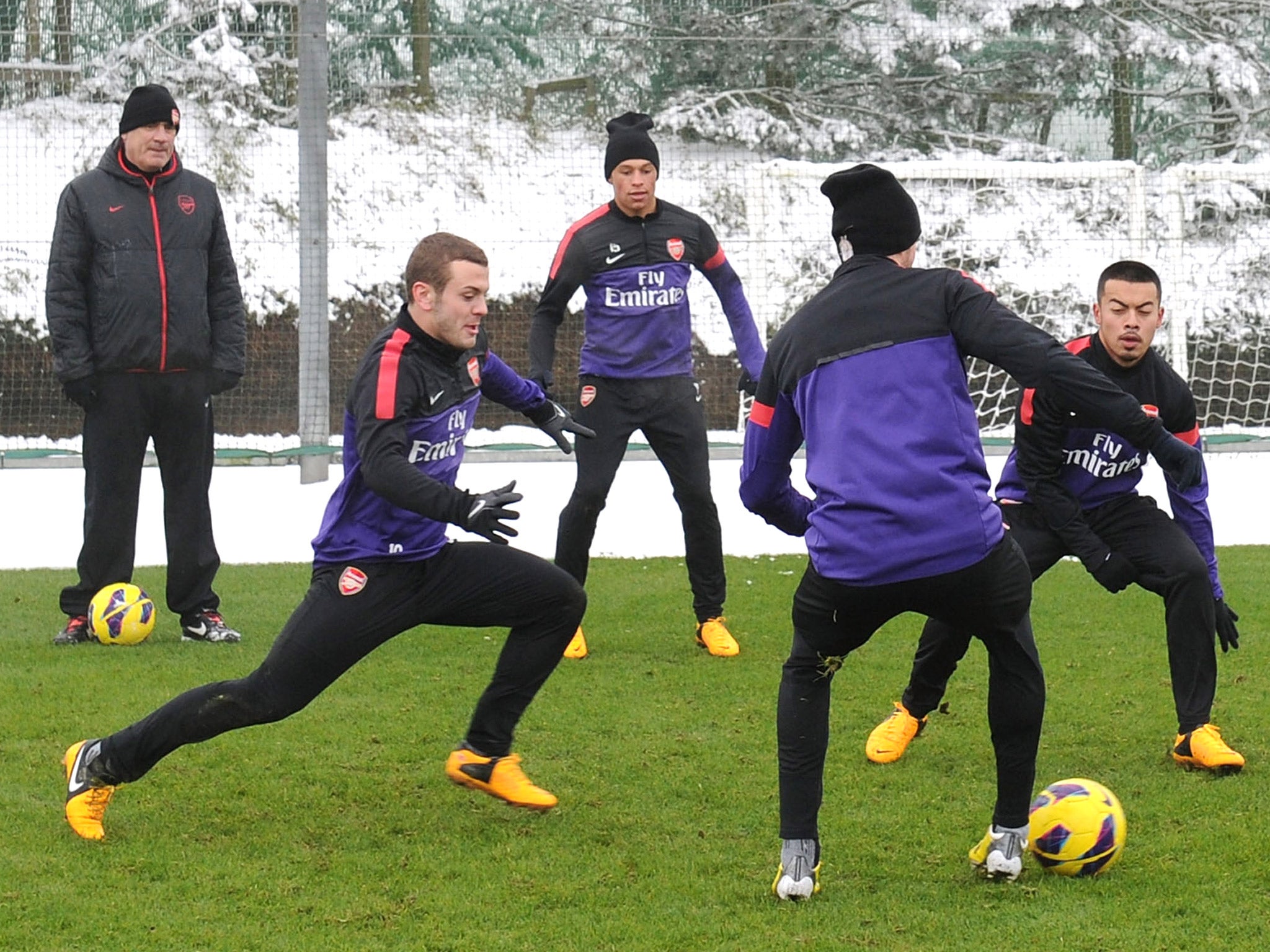 Arsenal’s Jack Wilshere (left) trains at London Colney