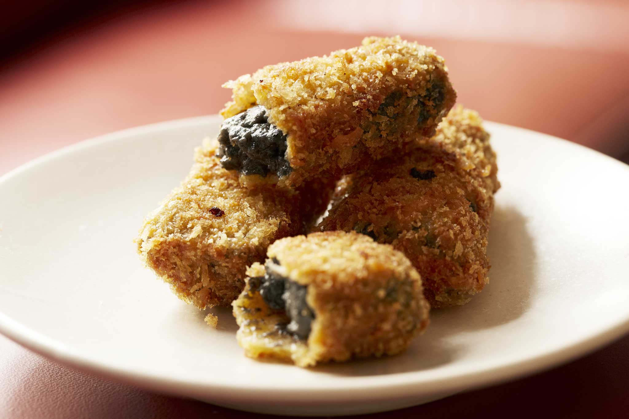 Mark liked cuttlefish croquetas so much that he put it on the menu at Fish House