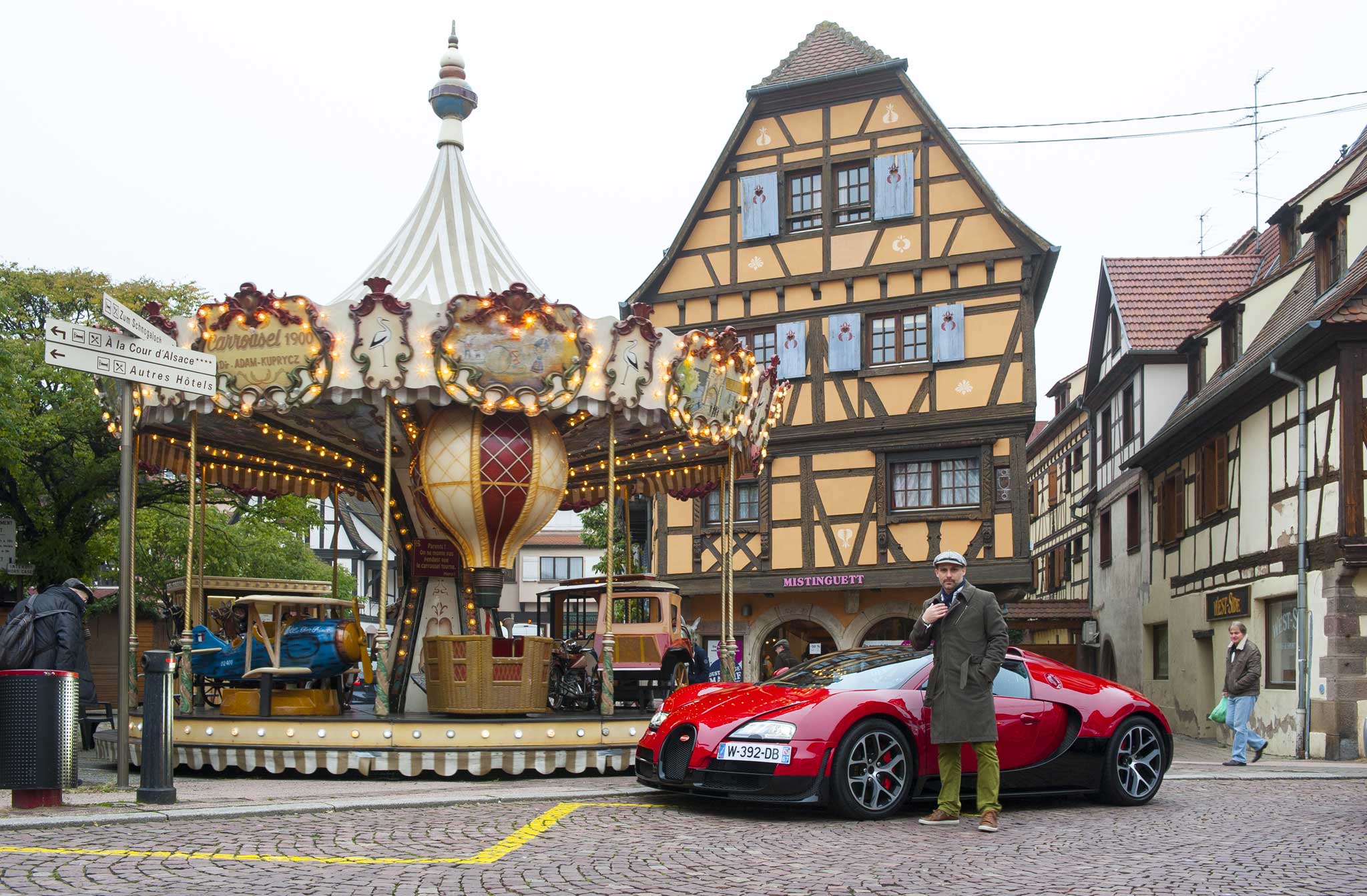 Travelling in style: Michael poses with the Bugatti Veyron 16.4 Grand Super Sport Vitesse