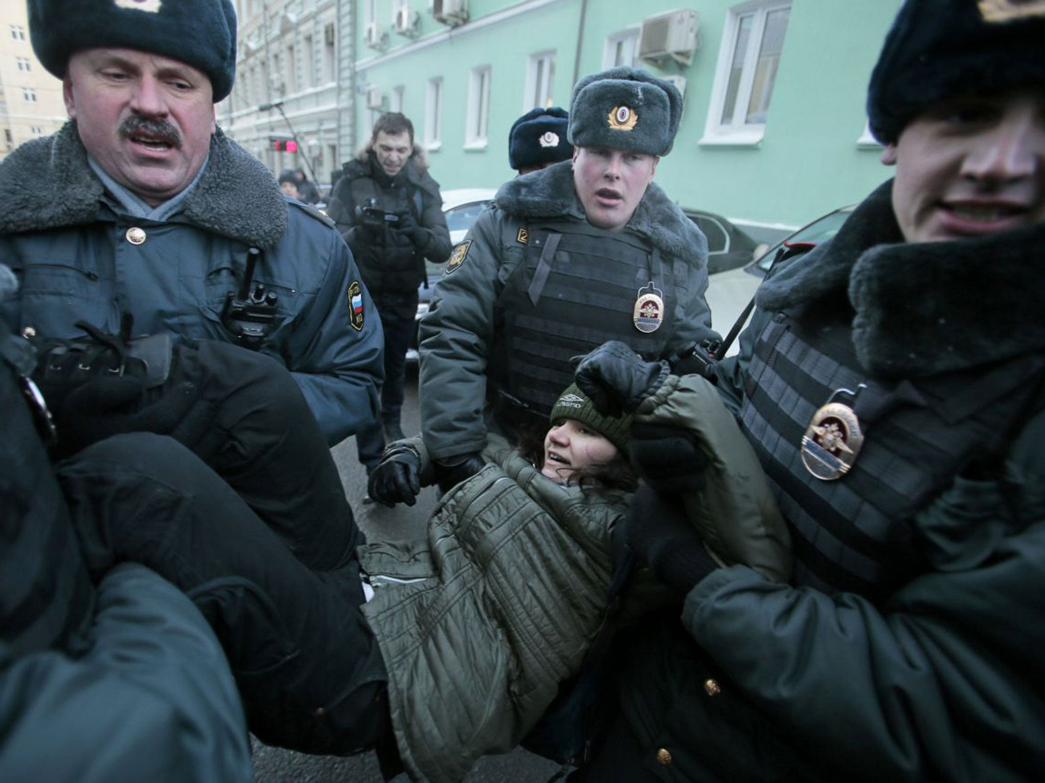 Police held gay rights activists who staged a protest against the Bill, which targets those who promote homosexuality to children
