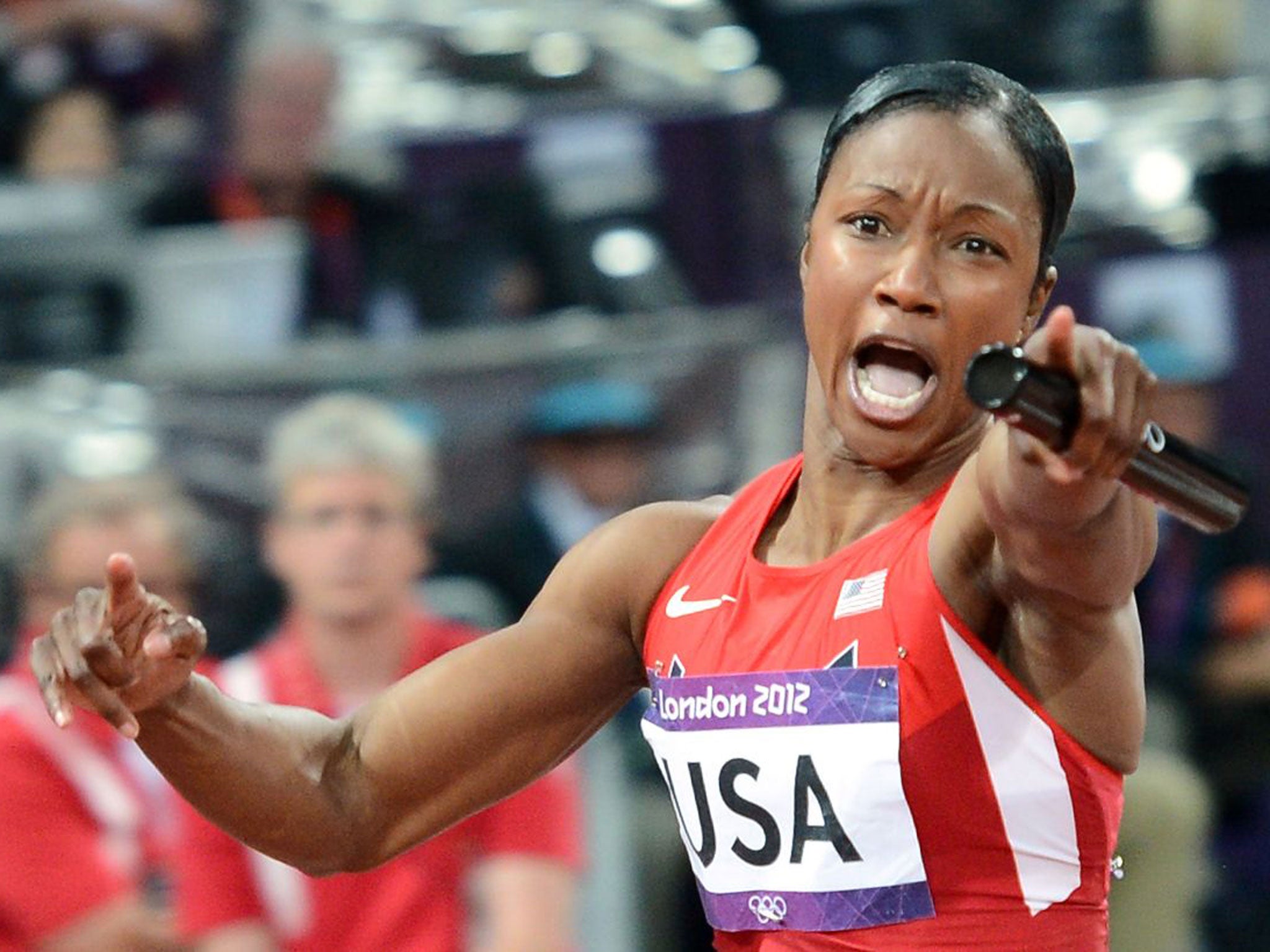 Carmelita Jeter celebrates winning Olympic relay gold