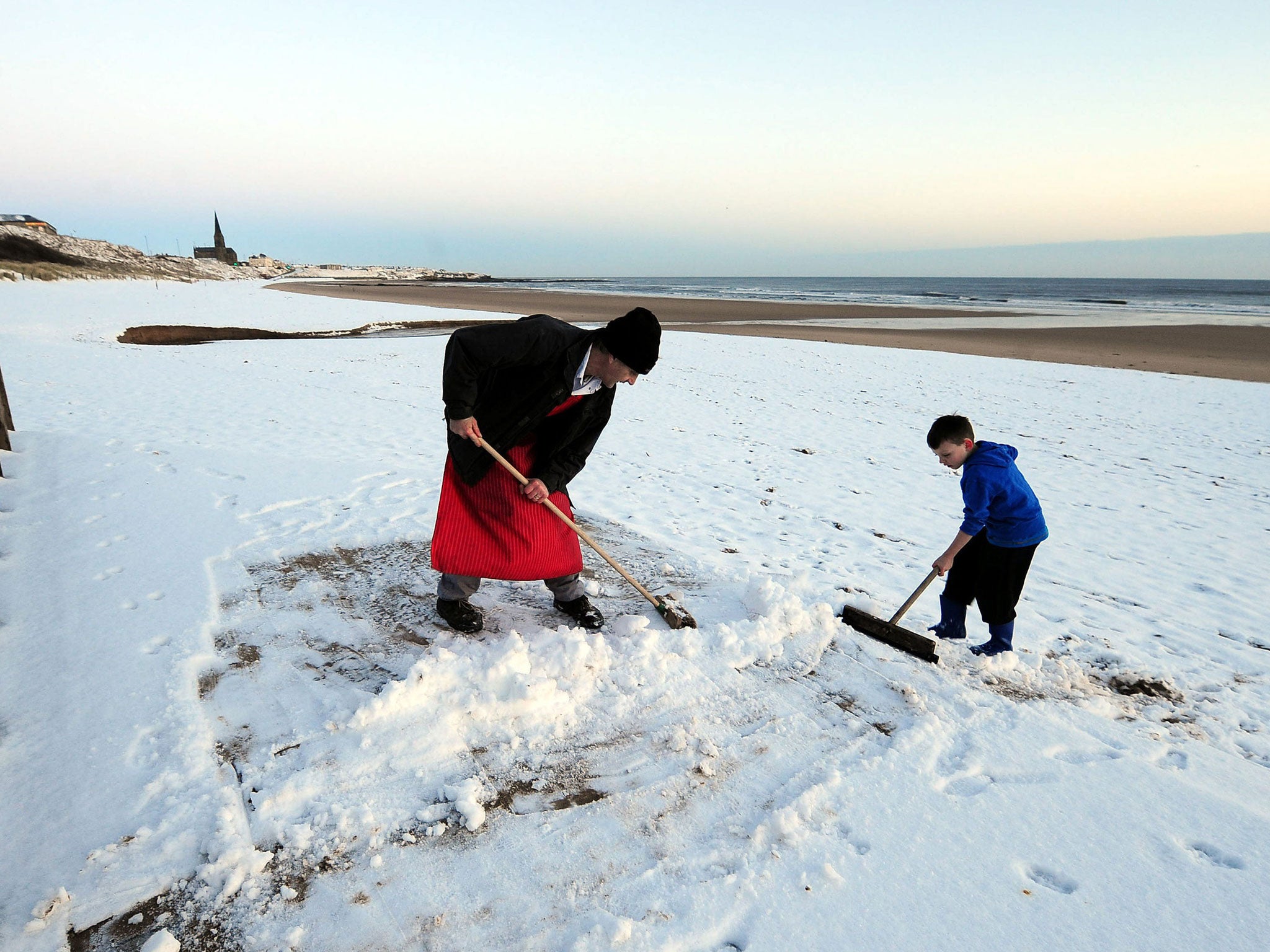 Clearing snow on Tynemouth beach, yesterday