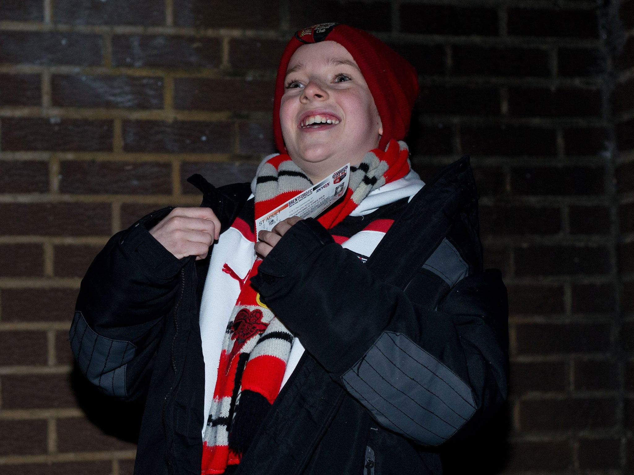 Over half a century after a young Brentford fan was pictured clutching his ticket for the Chelsea game, 12-year-old Saul Westbrook recreates the experience