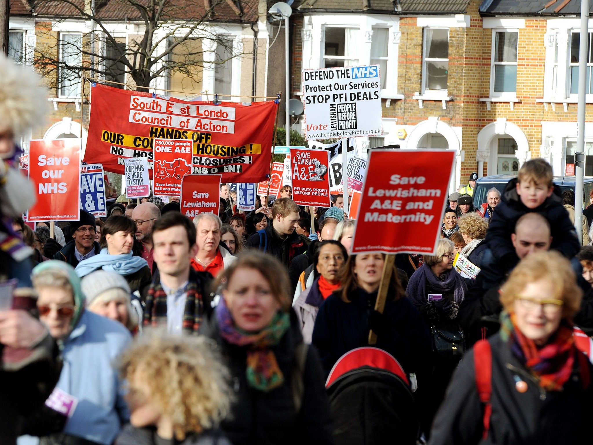 Protesters taking part in a demonstration against the possible closure of their local A&E and maternity services at Lewisham Hospital