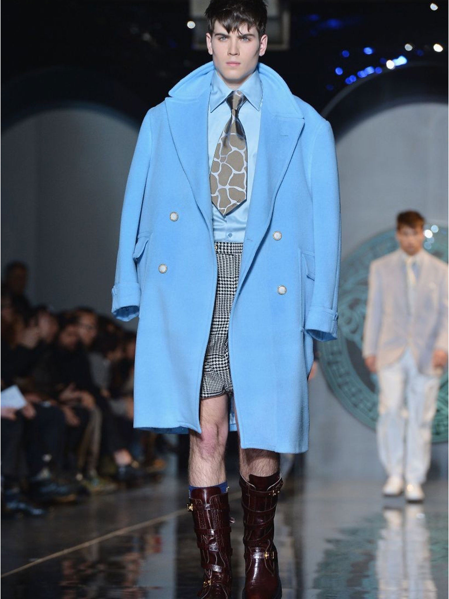 Attack of the giants (Versace pictured)

If there was one piece that ruled supreme it was the car coat. In every city you couldn't miss the variations on the shape – ankle-length, wide-lapelled and single-breasted with sloping shoulders and waist-level front buttons. And you couldn't miss them because they were all, well, enormous.

The giant car coat came in super soft cashmere silk at Ermenegildo Zegna, in Magritte-esque cloud print at Kenzo, was worn with shorts and a fat tie at Versace, and with nothing underneath, flasher-style, at JW Anderson's androgynous show in London. “Best in show” goes to Lanvin, which delivered a beautiful car coat with a vintage silhouette and zipped pockets in a collection driven by oversized proportions and relaxed tailoring.