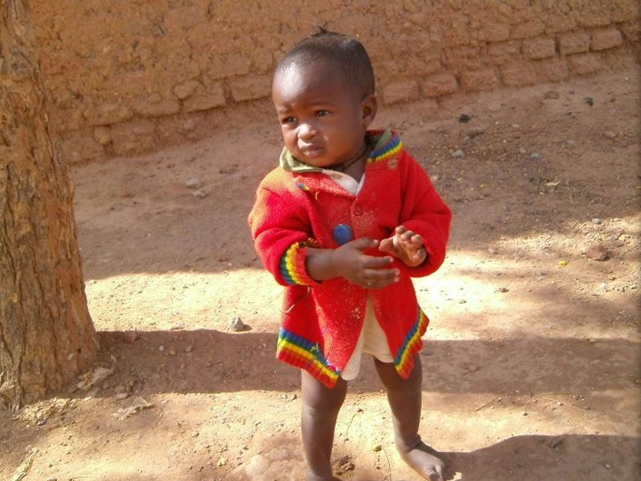 One-year-old Saida Jallo was thrown clear by the French bomb that killed his mother