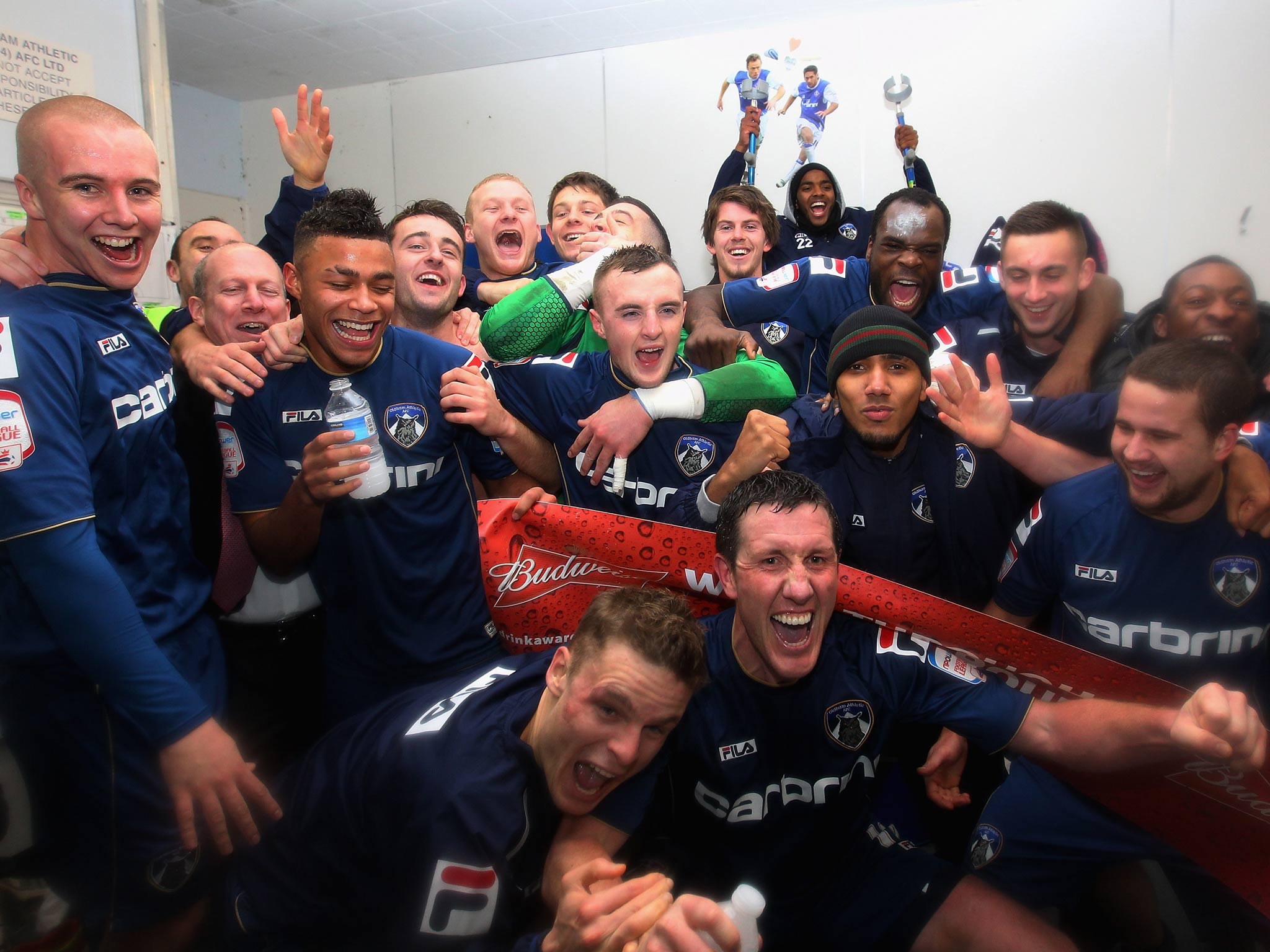 Oldham celebrate their FA Cup victory over Liverpool