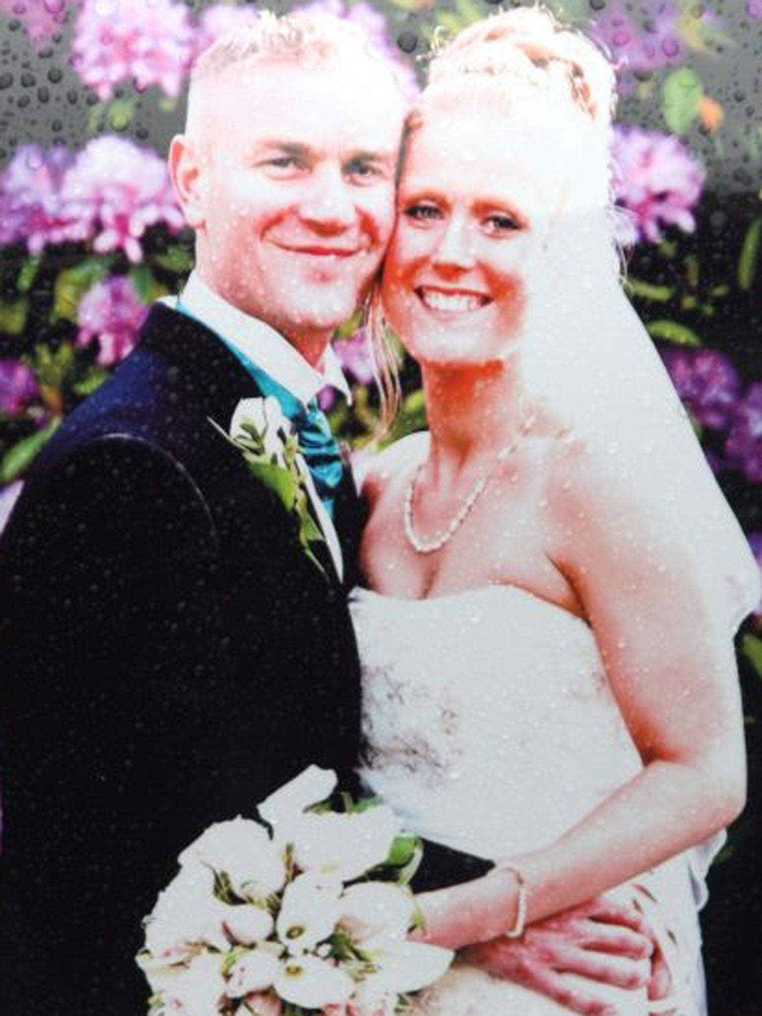 A picture left at the scene in Hanham, near Bristol, in tribute to Ross and Clare Simons, who were killed when their tandem bike was struck by a car