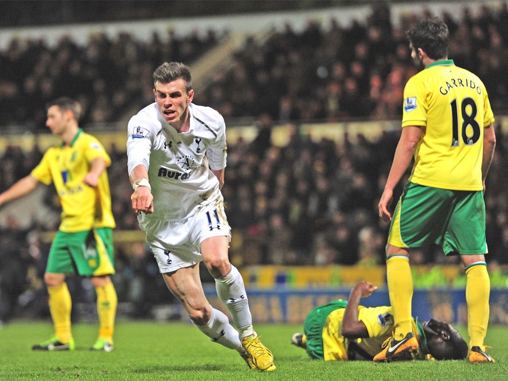 Gareth Bale wheels away in relief after scoring a late equaliser for Spurs