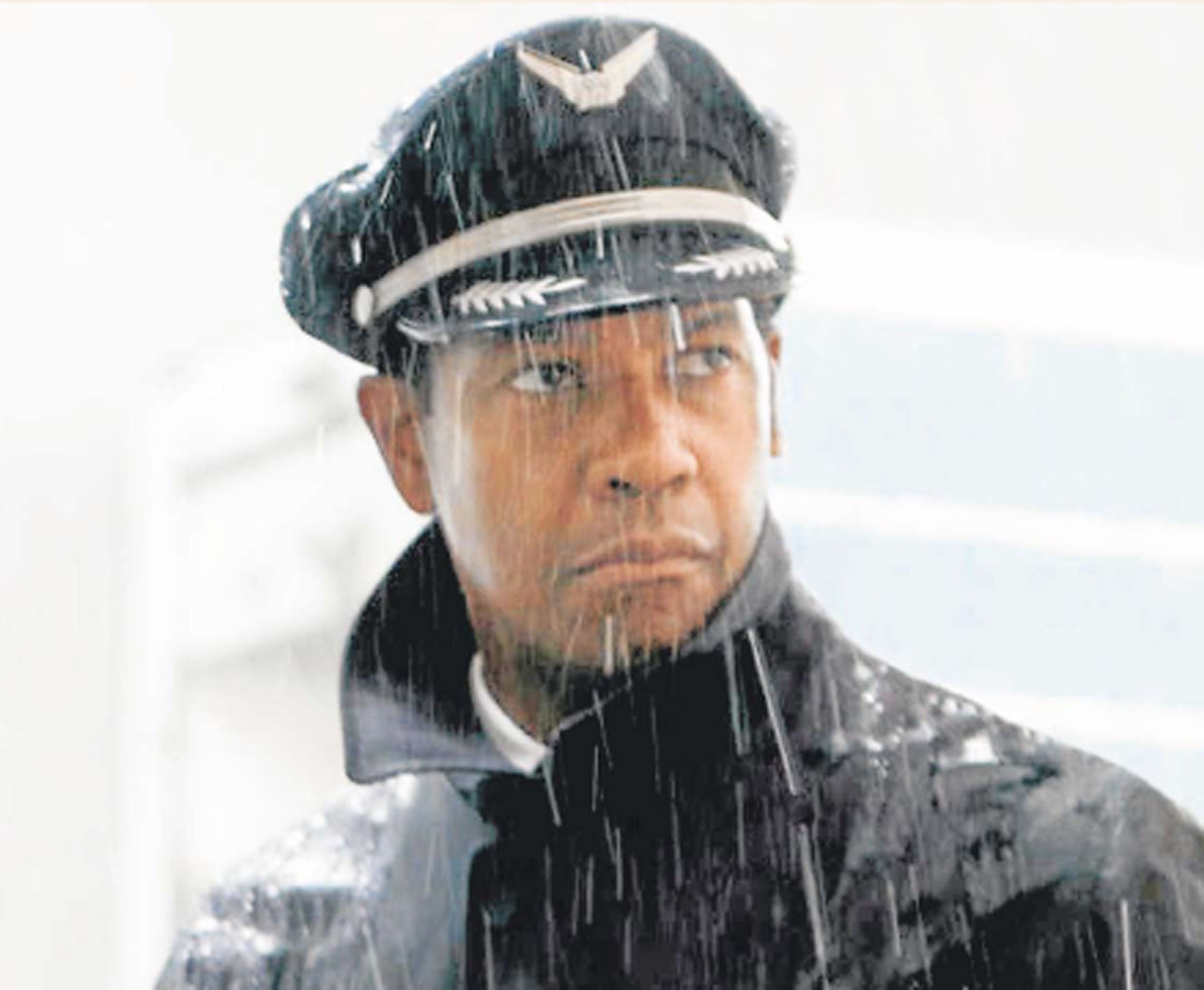 Raining day: Denzel Washington stars as an alcoholic and drug-fuelled airline pilot in the drama 'Flight'