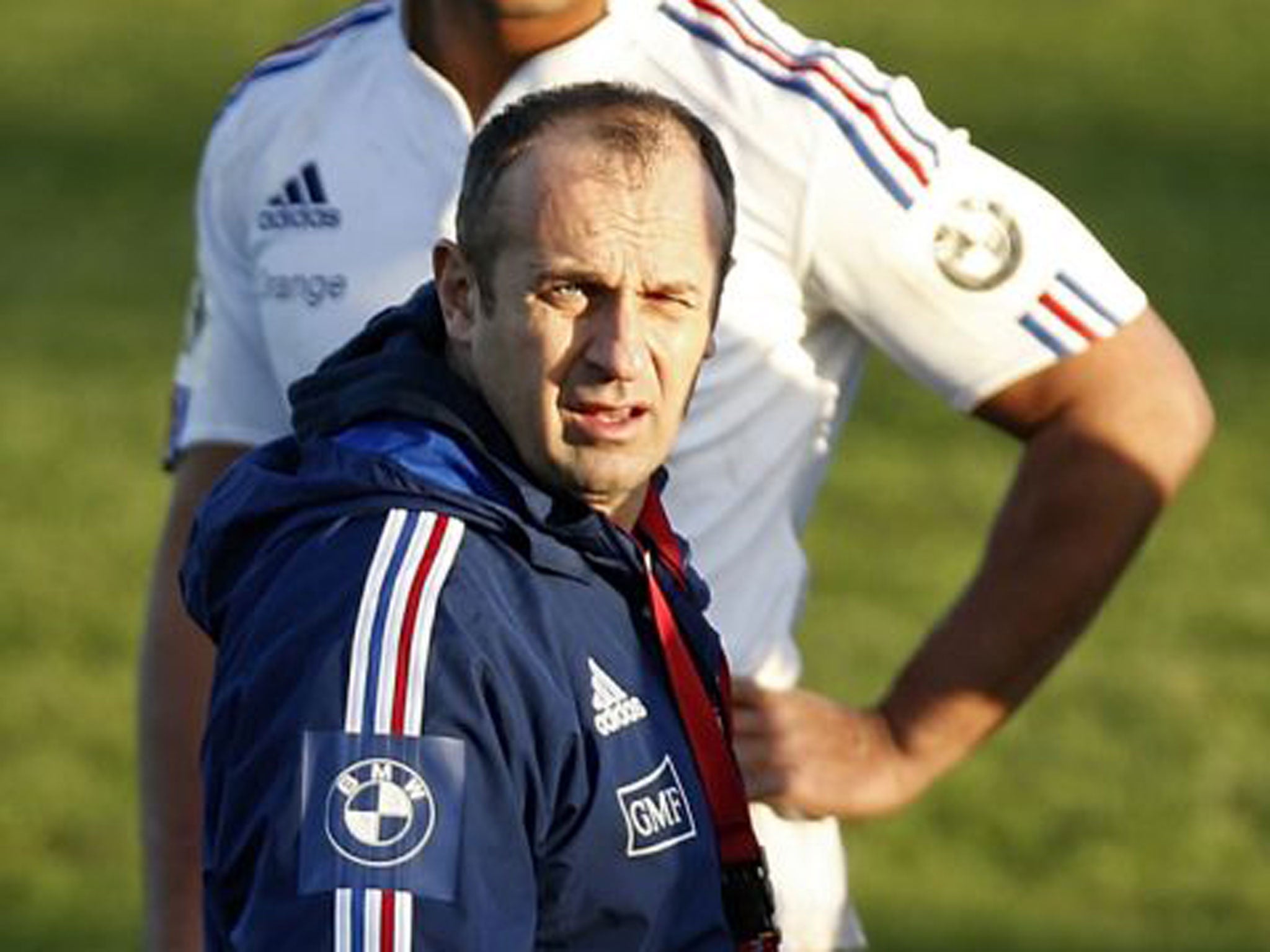 Thierry Dusautoir (back) and coach Philippe Saint-André at a France training session yesterday