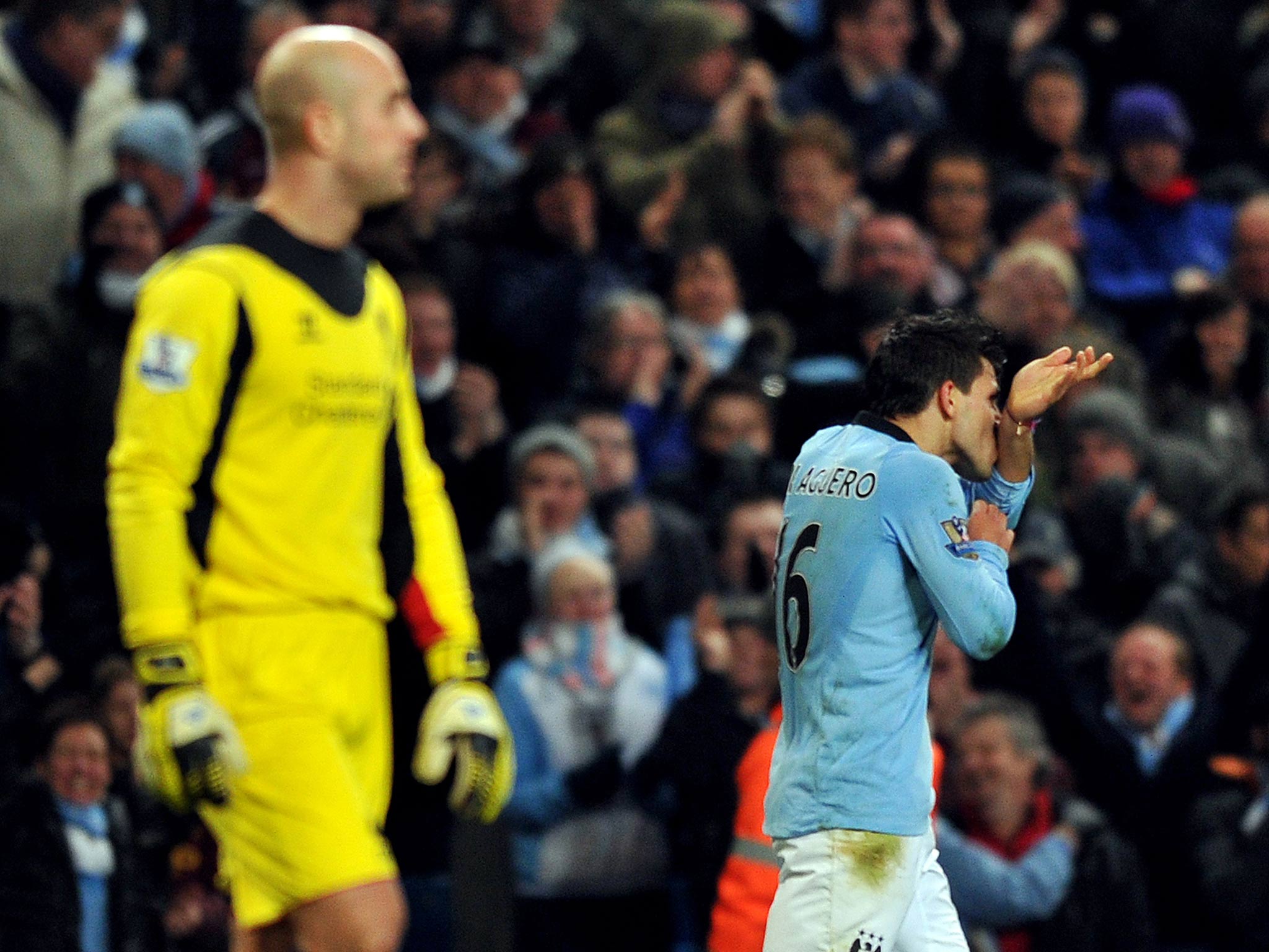 Sergio Aguero celebrates after scoring from a near impossible angle for Manchester City during their 2-2 draw with Liverpool