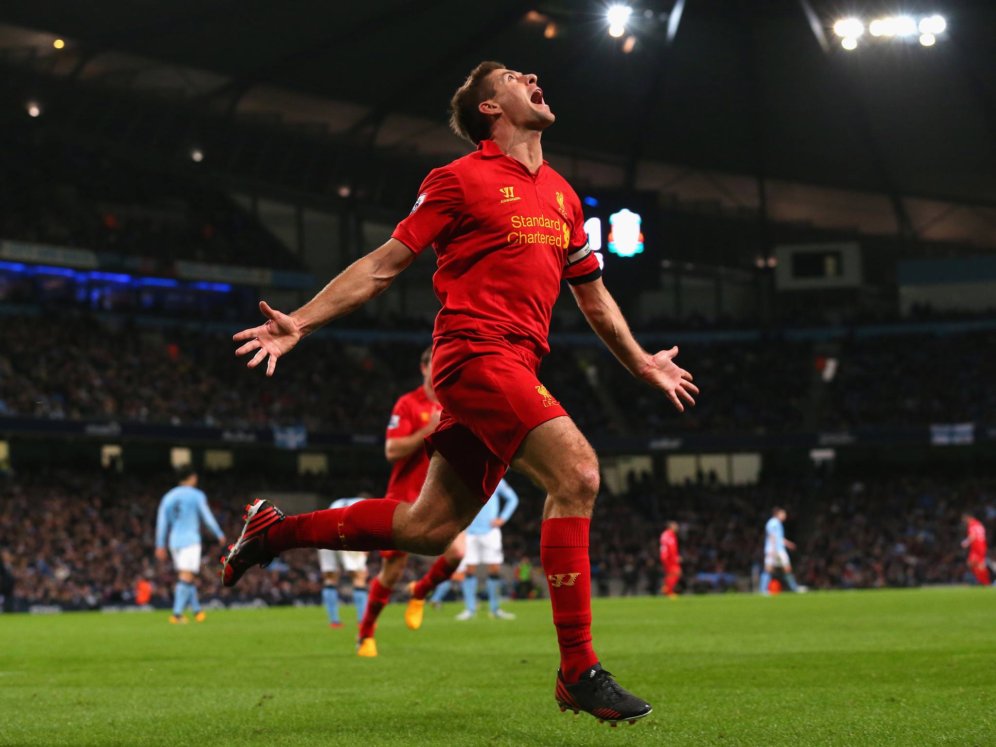 Steve Gerrard celebrates his stunning goal against Manchester City