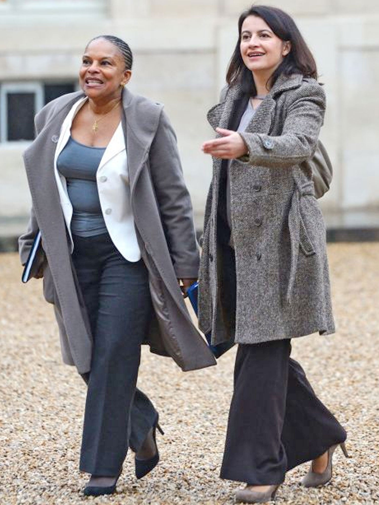 French ministers Cecile Duflot, right, and Christiane Taubira at the Elysee Palace on Sunday – in trousers