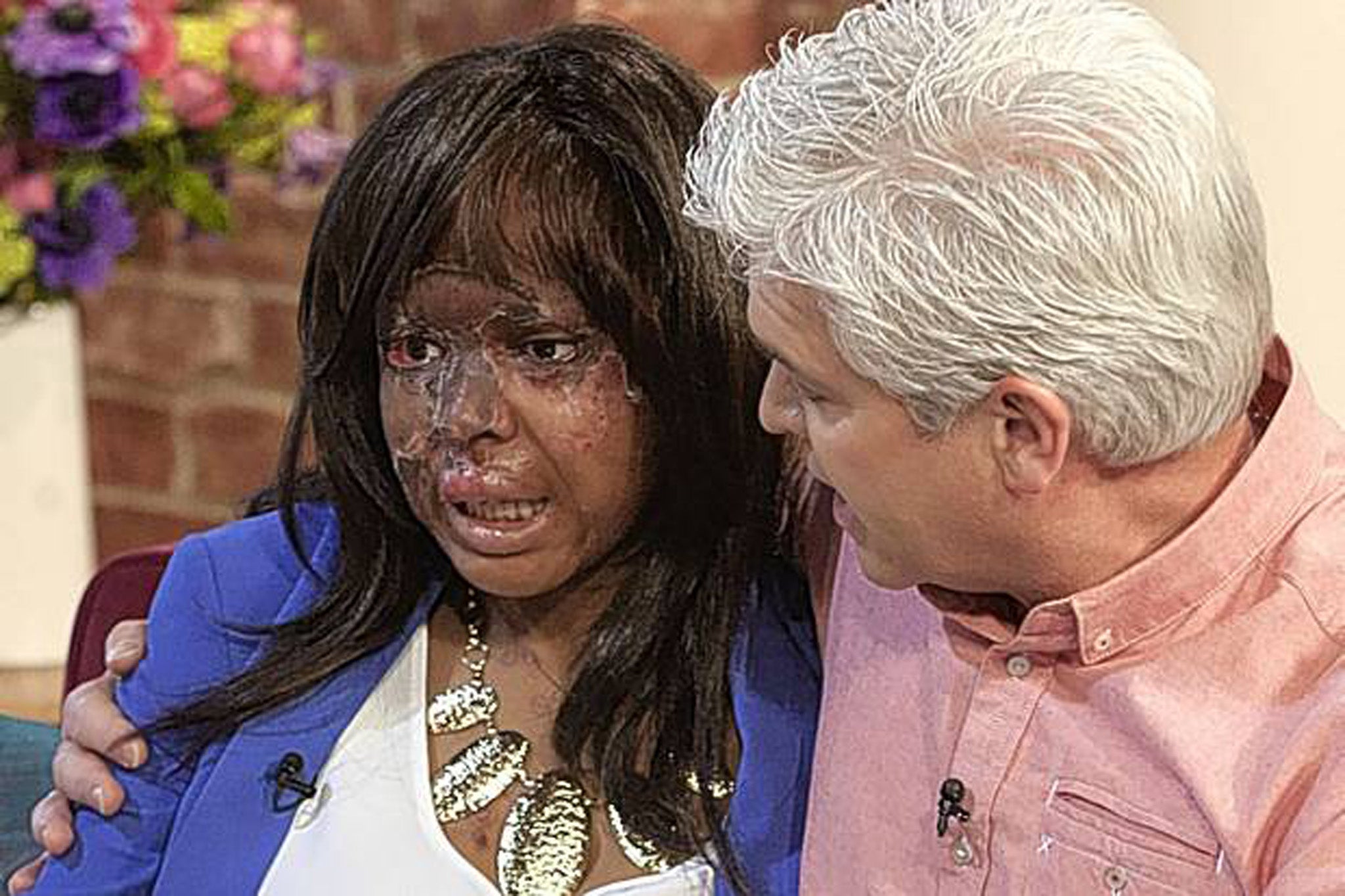 Naomi Oni is comforted by Philip Schofield on This Morning