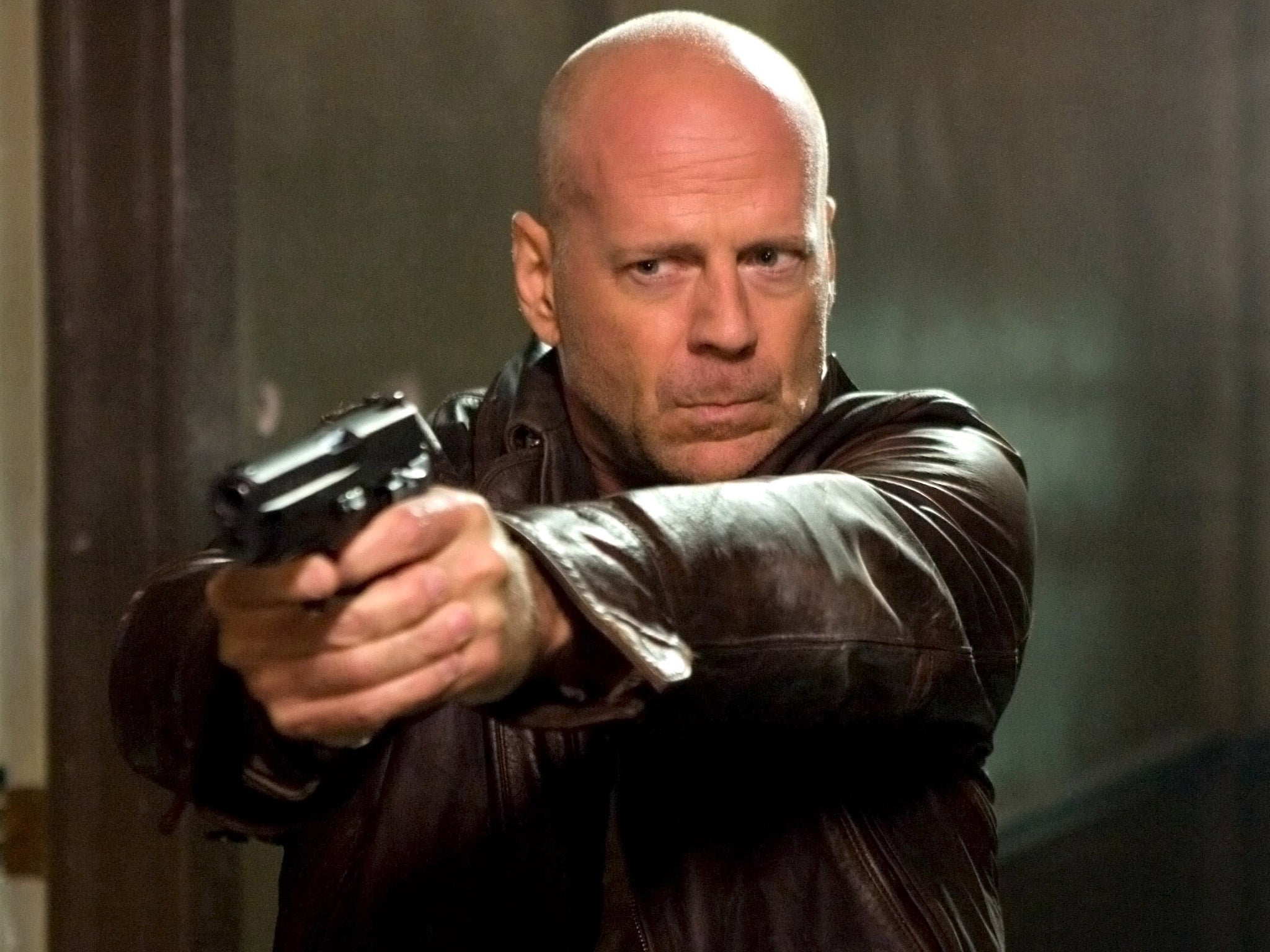 Bruce Willis fires a weapon in 2007's 'Die Hard 4.0'