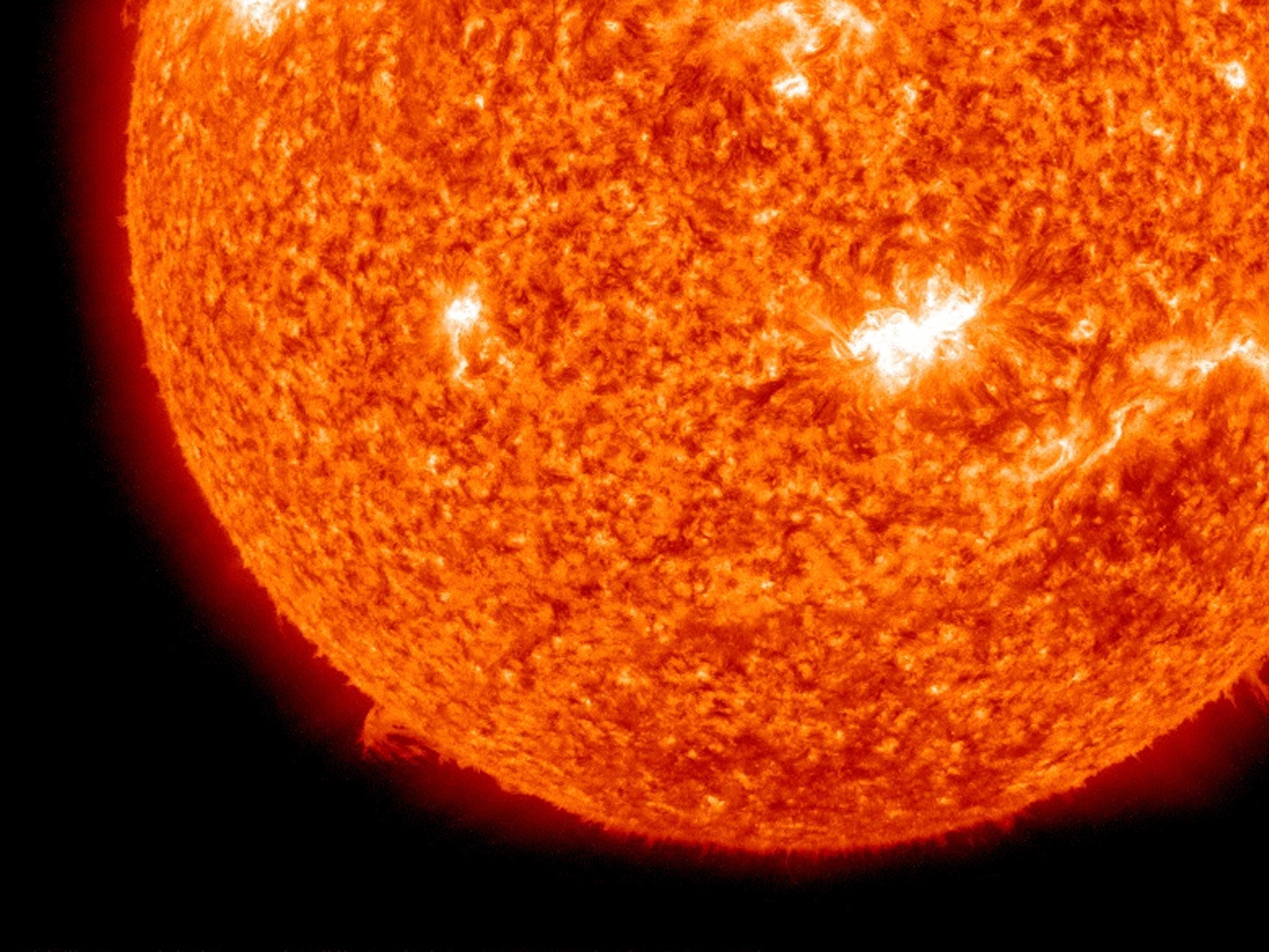 In a screen grab taken from a handout timelapse sequence provided by NASA / SDO, a solar spot in the centre of the Sun is captured from which the first X-class flare was emitted in four years on February 14, 2011.