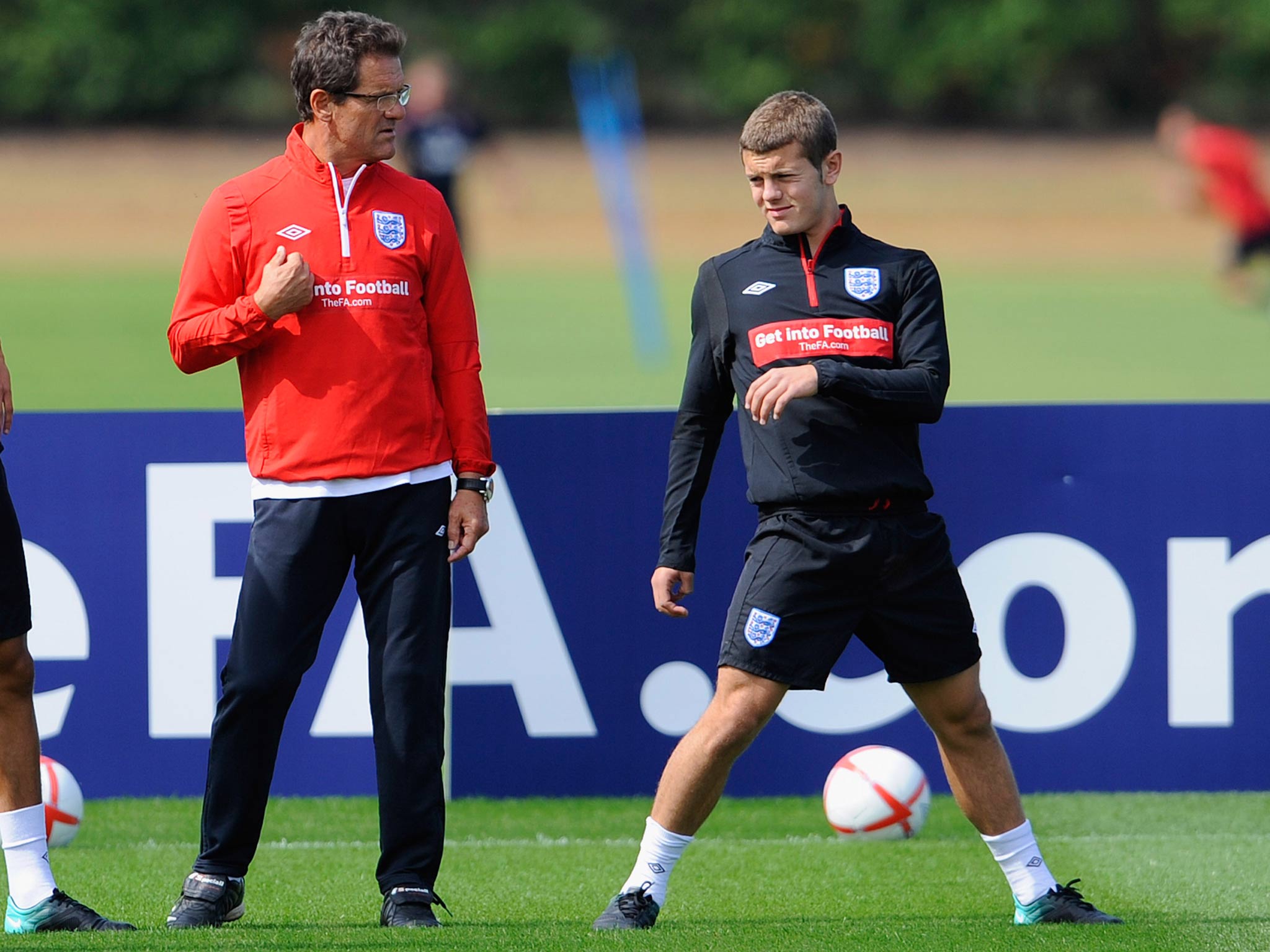 Jack Wilshere pictured training under the gaze of Fabio Capello in 2010