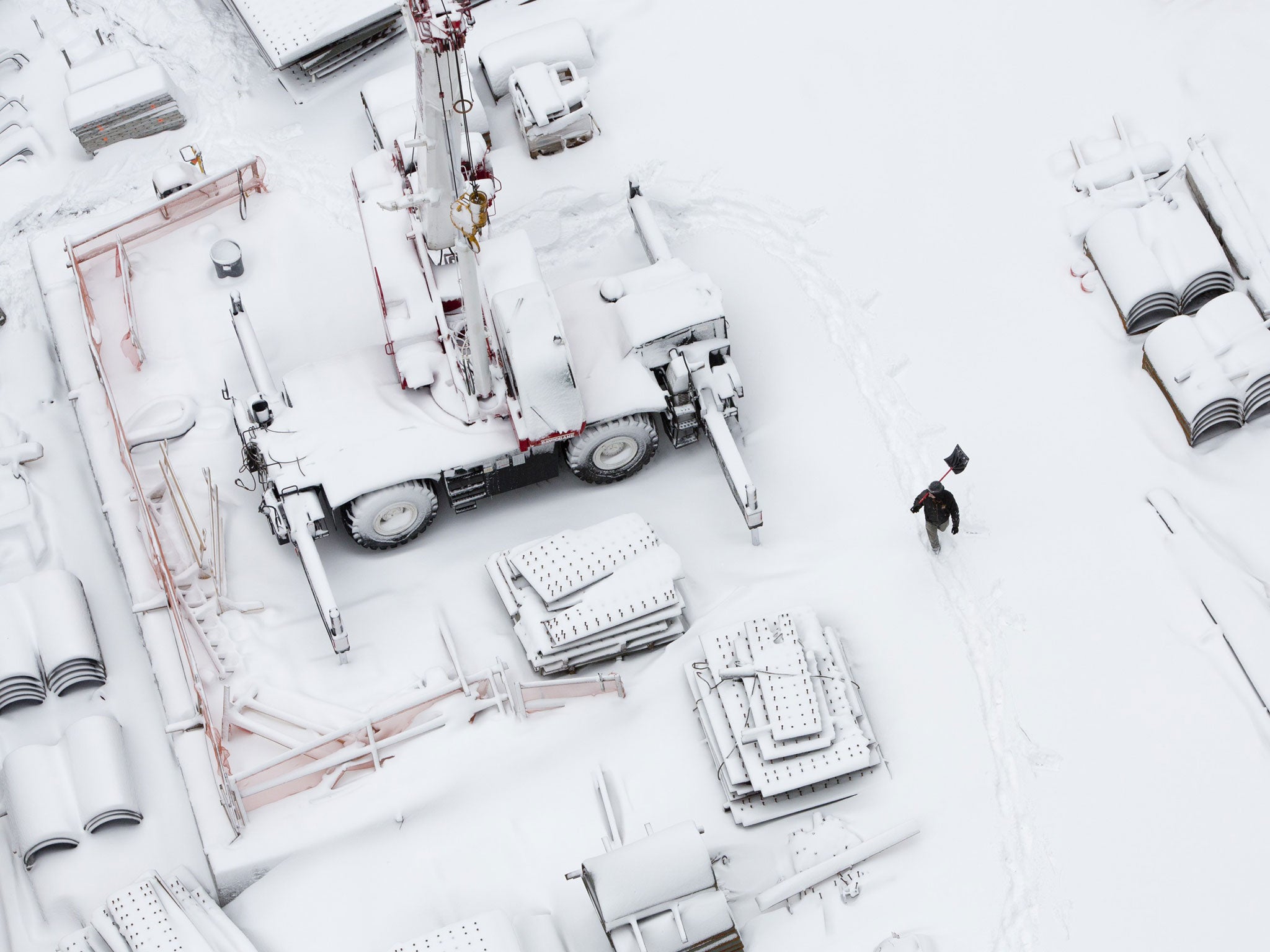 Snowed under: Ground Zero in Manhattan yesterday