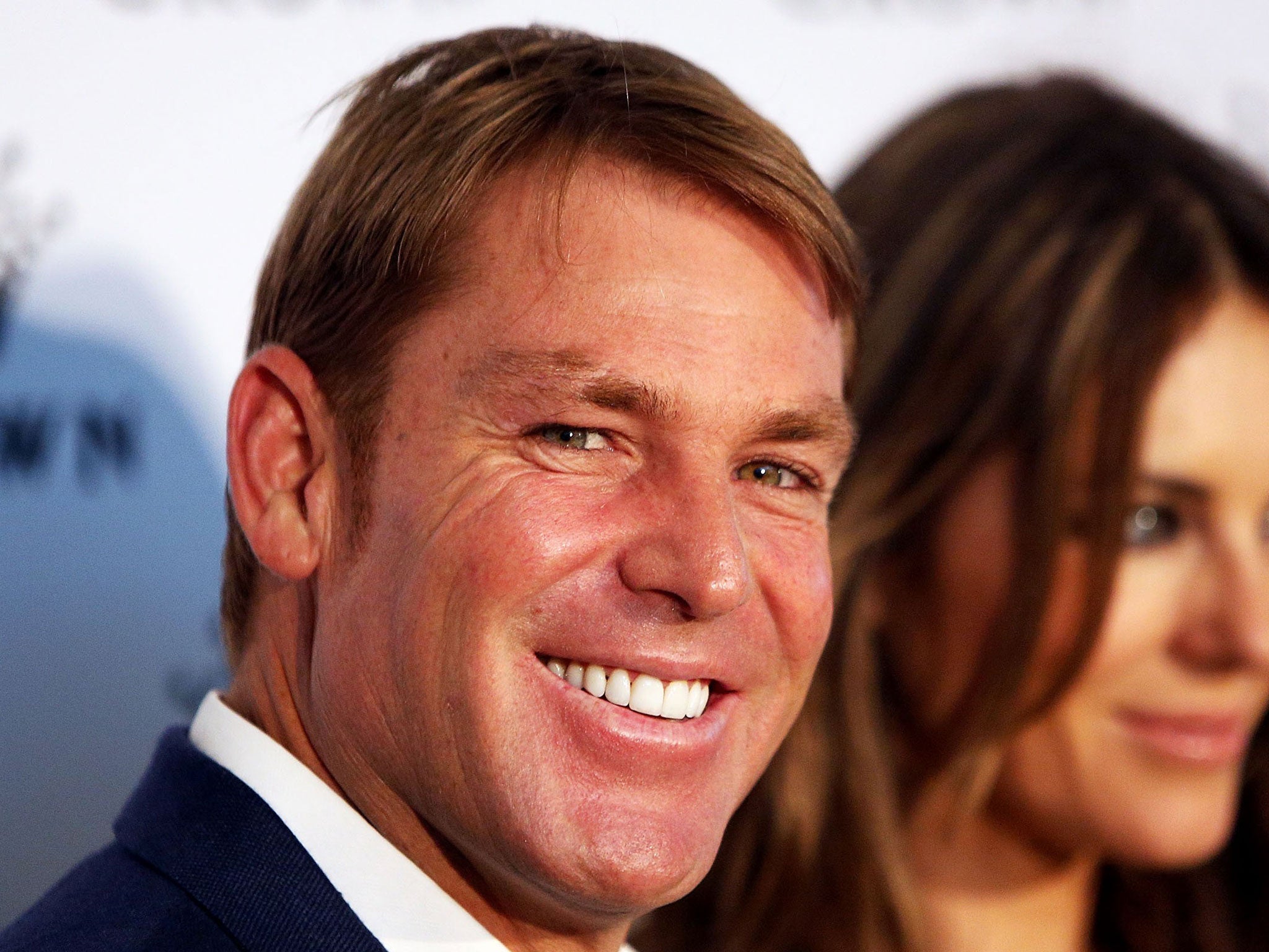 Shane Warne sports an advancing hairline