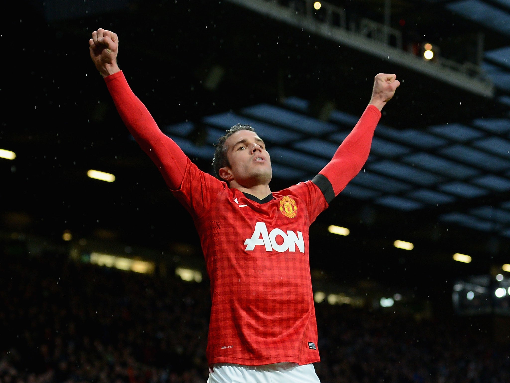 Robin van Persie celebrates scoring his goal