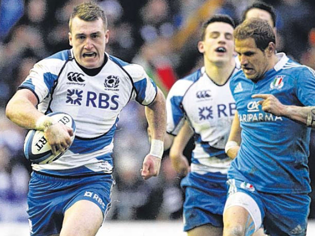 Stuart Hogg (left) claimed the try of the game for Scotland