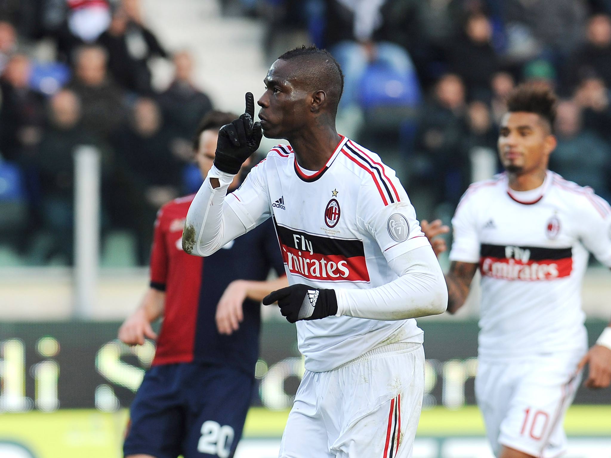 Mario Balotelli of AC Milan celebrates his goal scored from the penalty spot during the Serie A match between Cagliari Calcio and AC Milan at Stadio Is Arenas