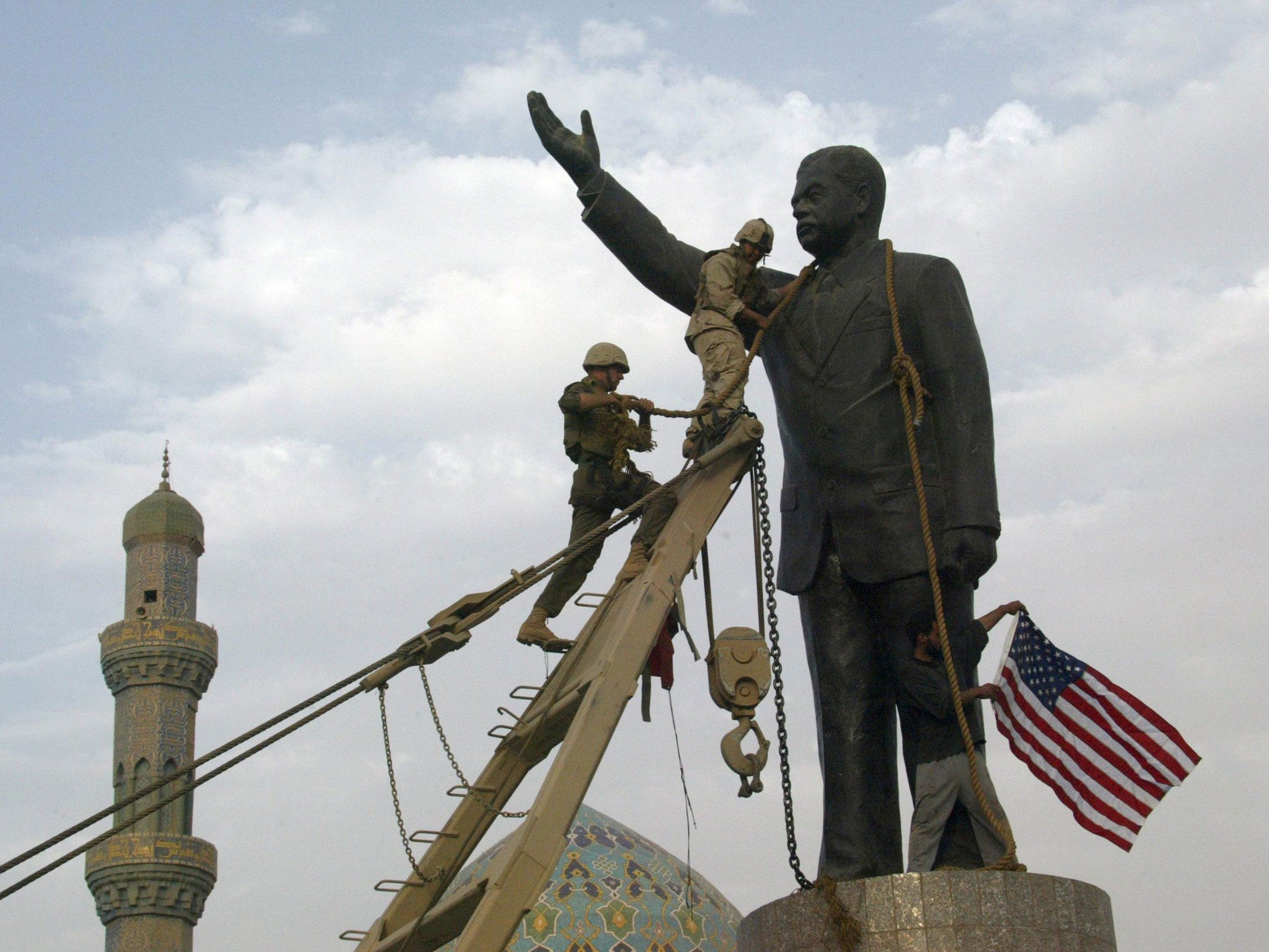 US Marines pull down the statue of Saddam in Baghdad