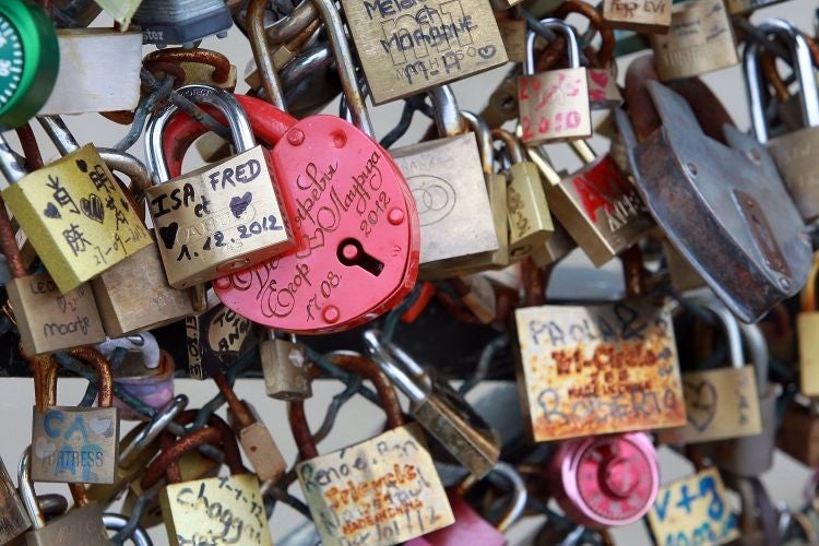 Padlocks adorn the Pont des Arts in Paris