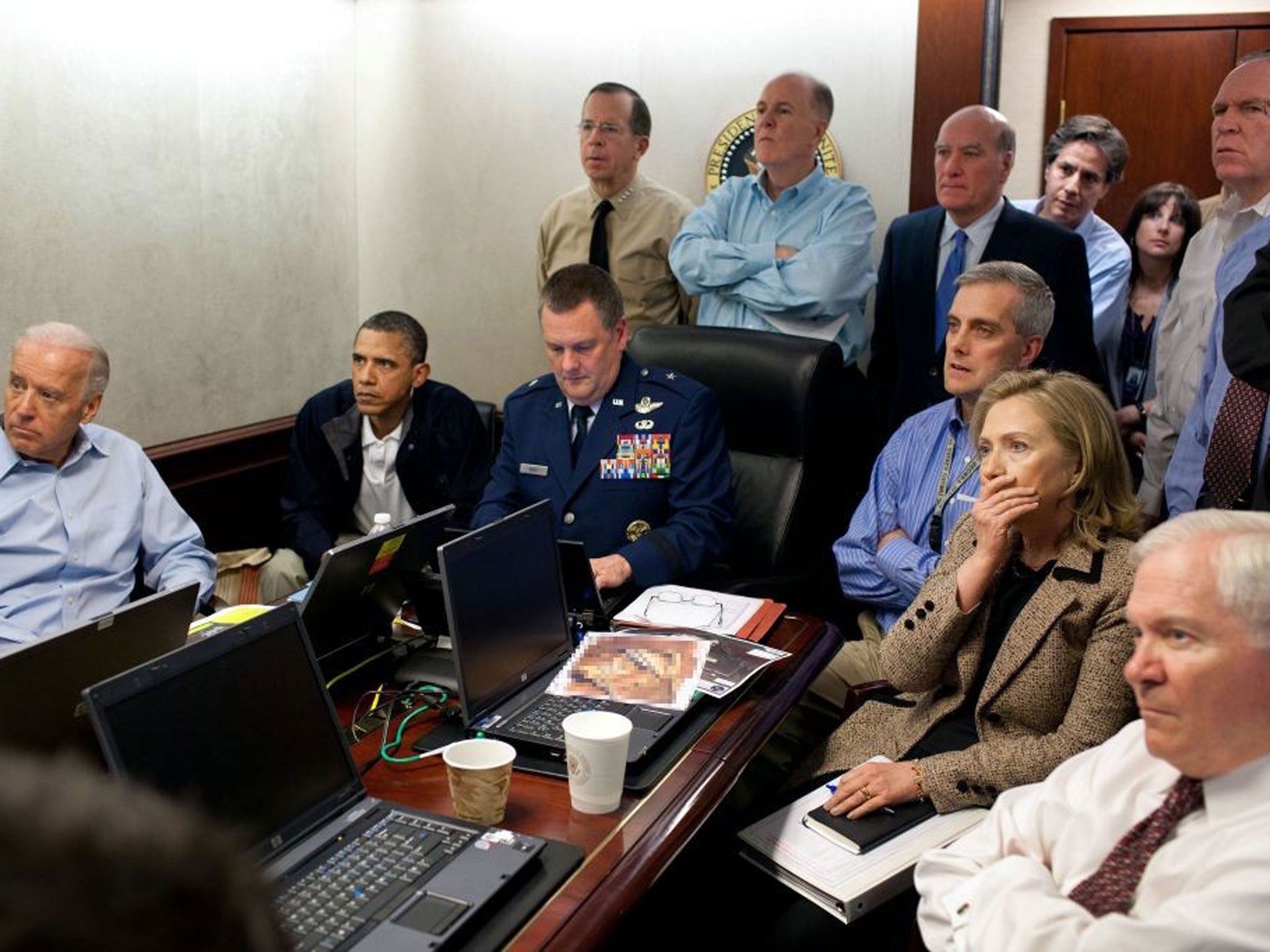 At The White House, President Barack Obama, Vice President Joe Biden and Secretary of State Hillary Clinton watch the capture of Osama Bin Laden
