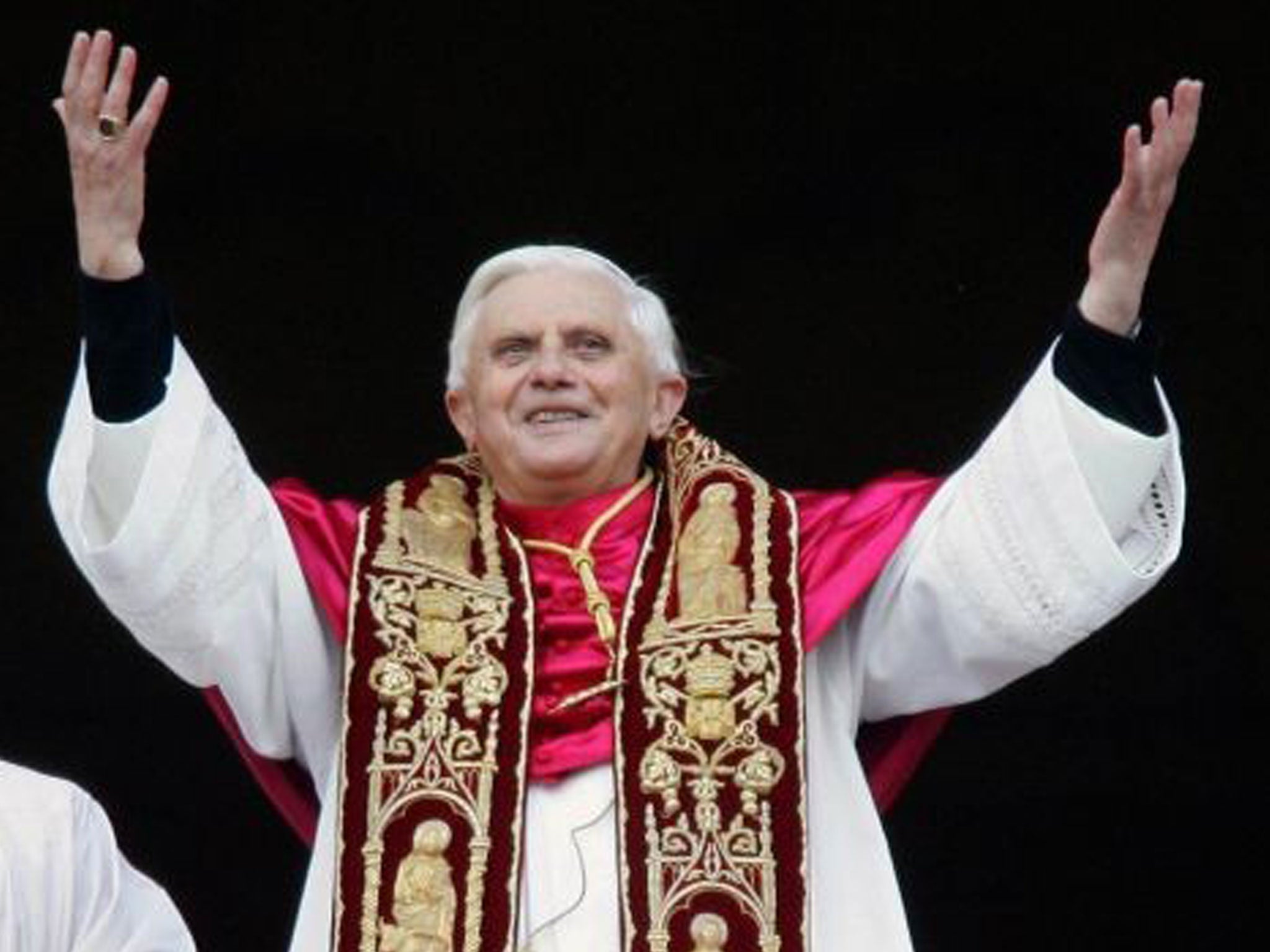 Benedict XVI appears at the main balcony of St Peter’s Basilica after being elected the 265th pope on 19 April 2005