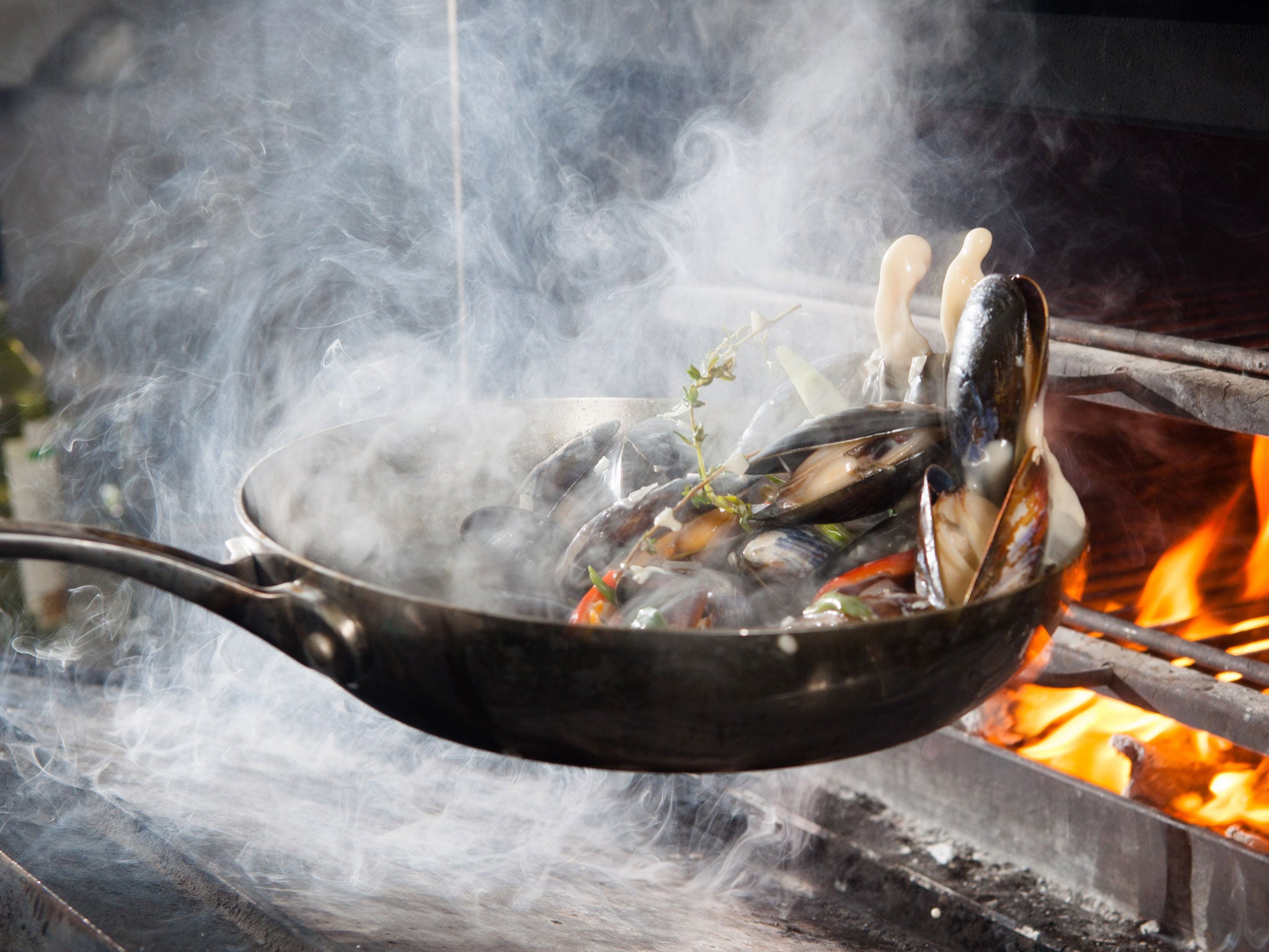 All fired up: Dave Scott smokes mussels on a Josper grill at the Blackwood in Edinburgh